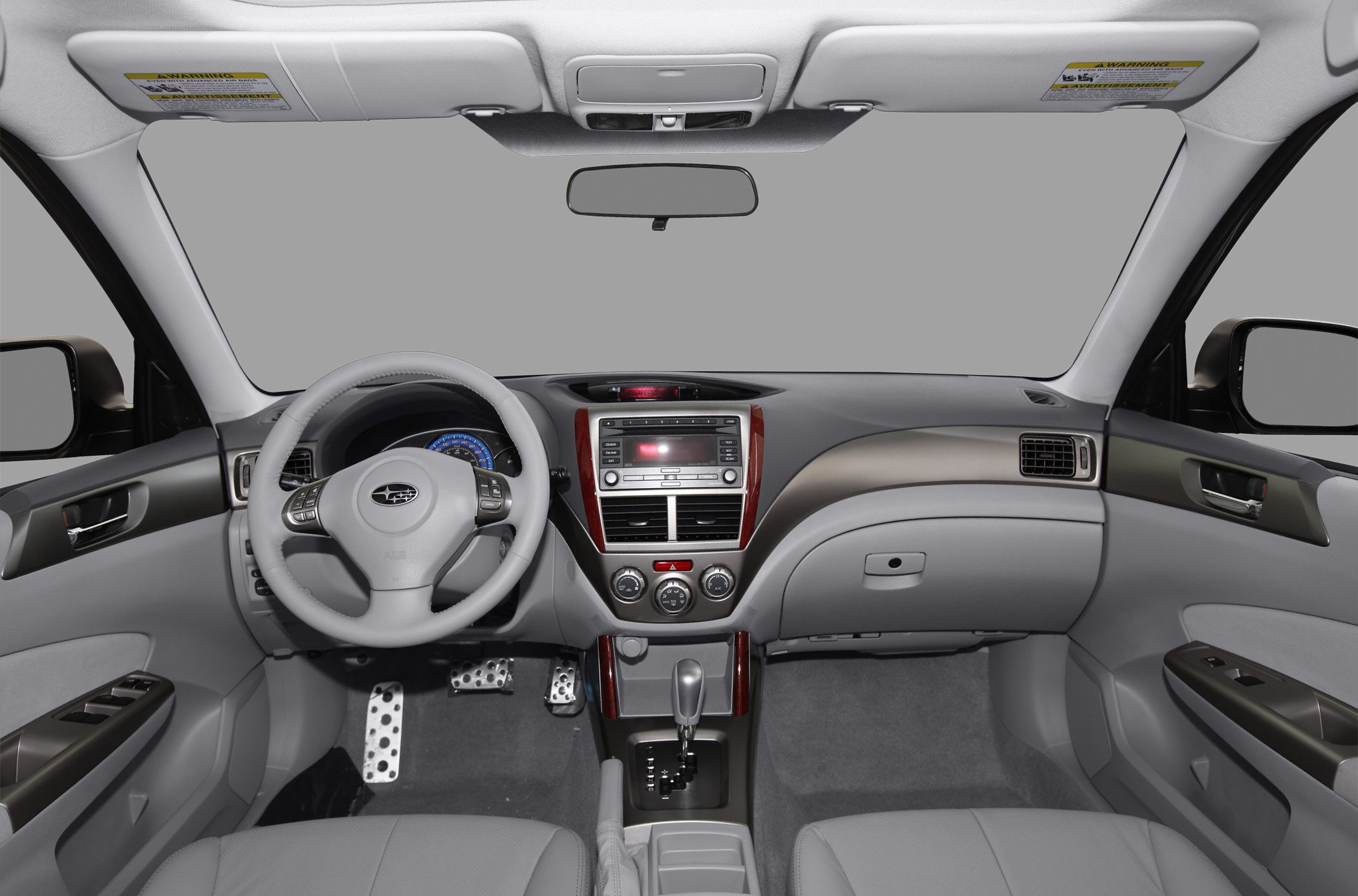 Dashboard and steering wheel with detailed controls and automatic gear shift
