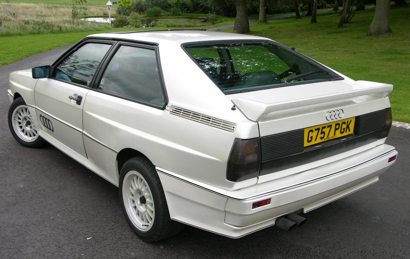Angular hatchback with rear spoiler and tinted tail lights