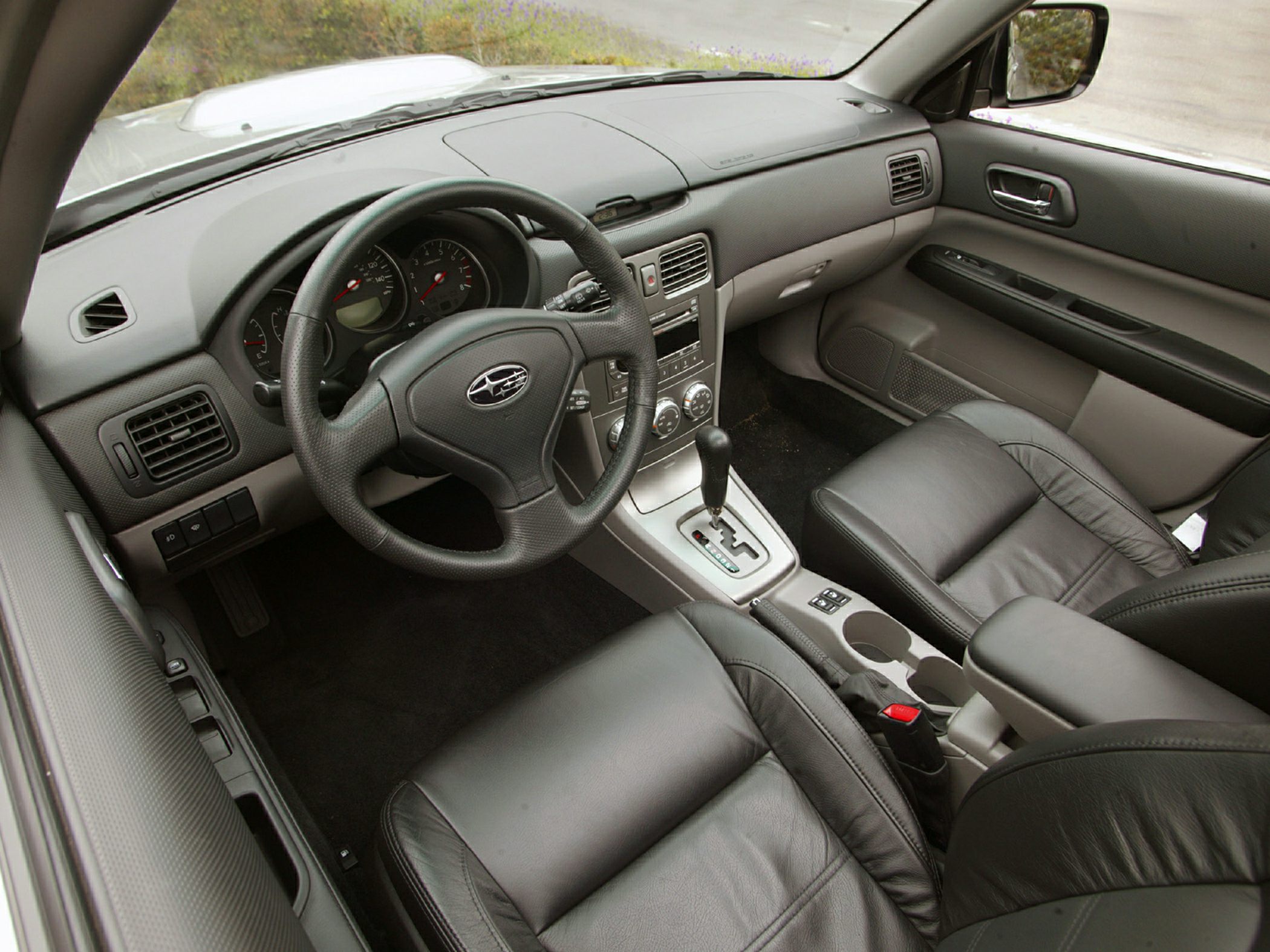 Dashboard and steering wheel with automatic gear shifter