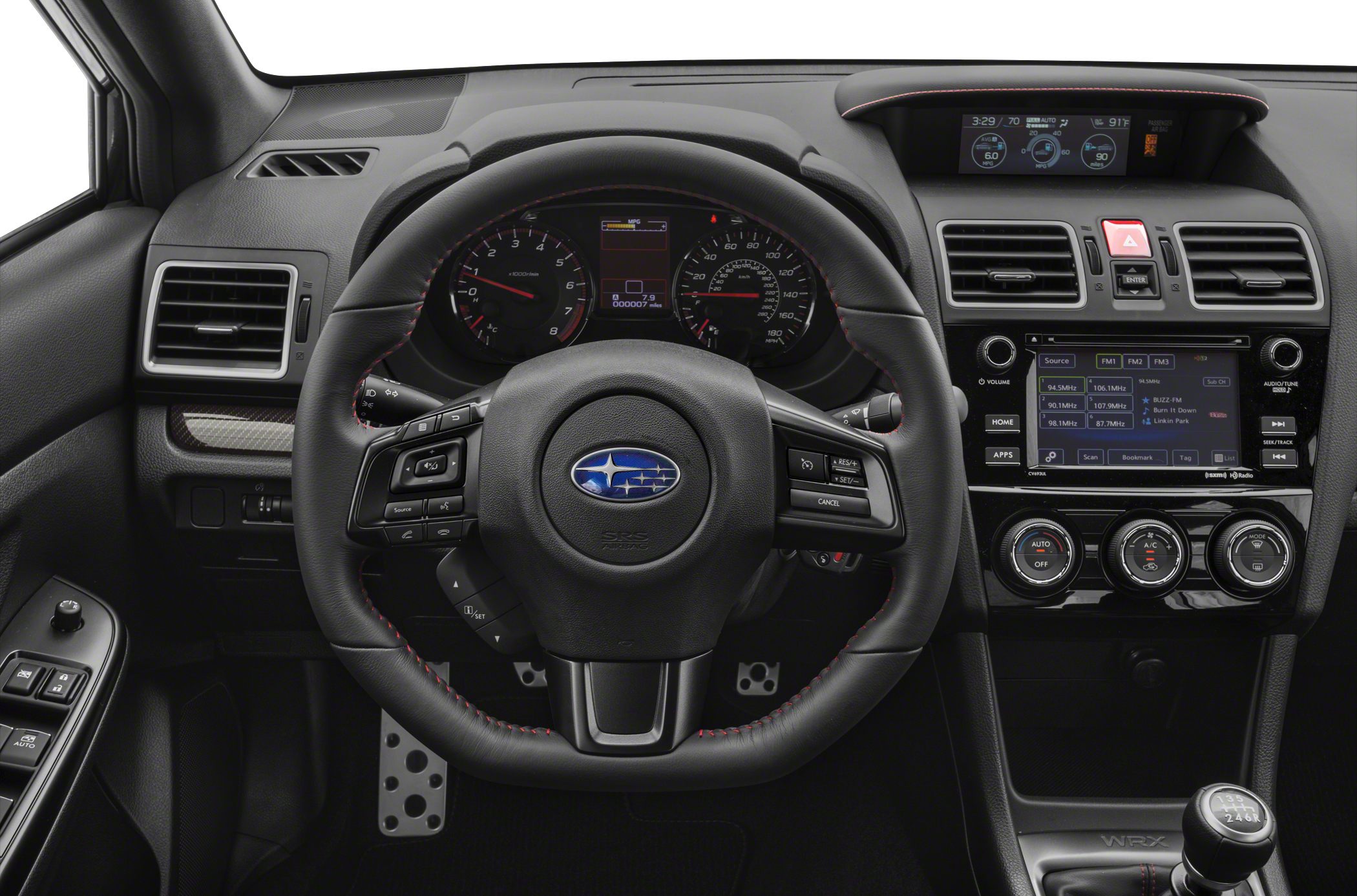 Dashboard with steering wheel, infotainment display, and manual gearshift