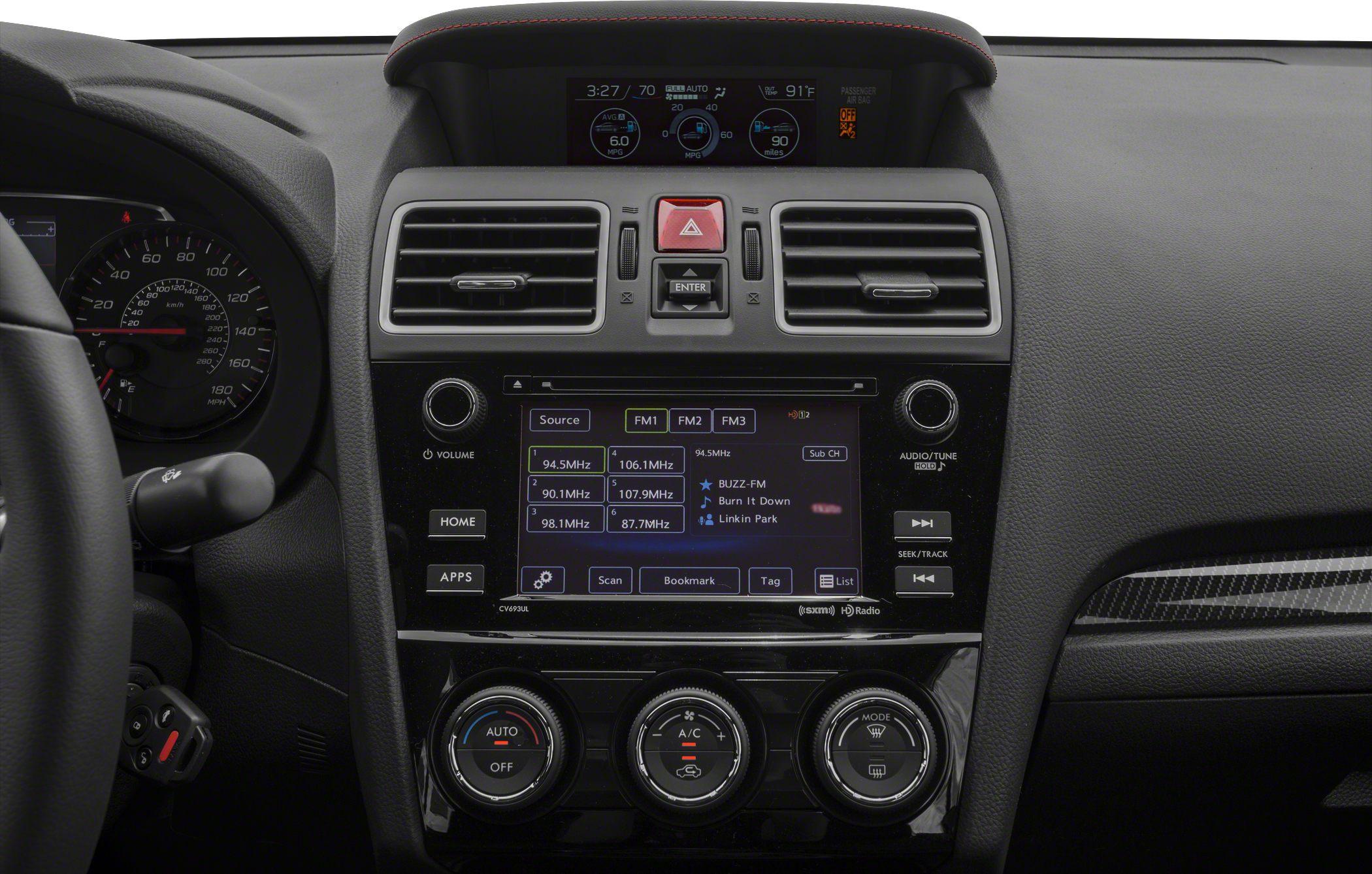 Digital dashboard with infotainment and climate control dials