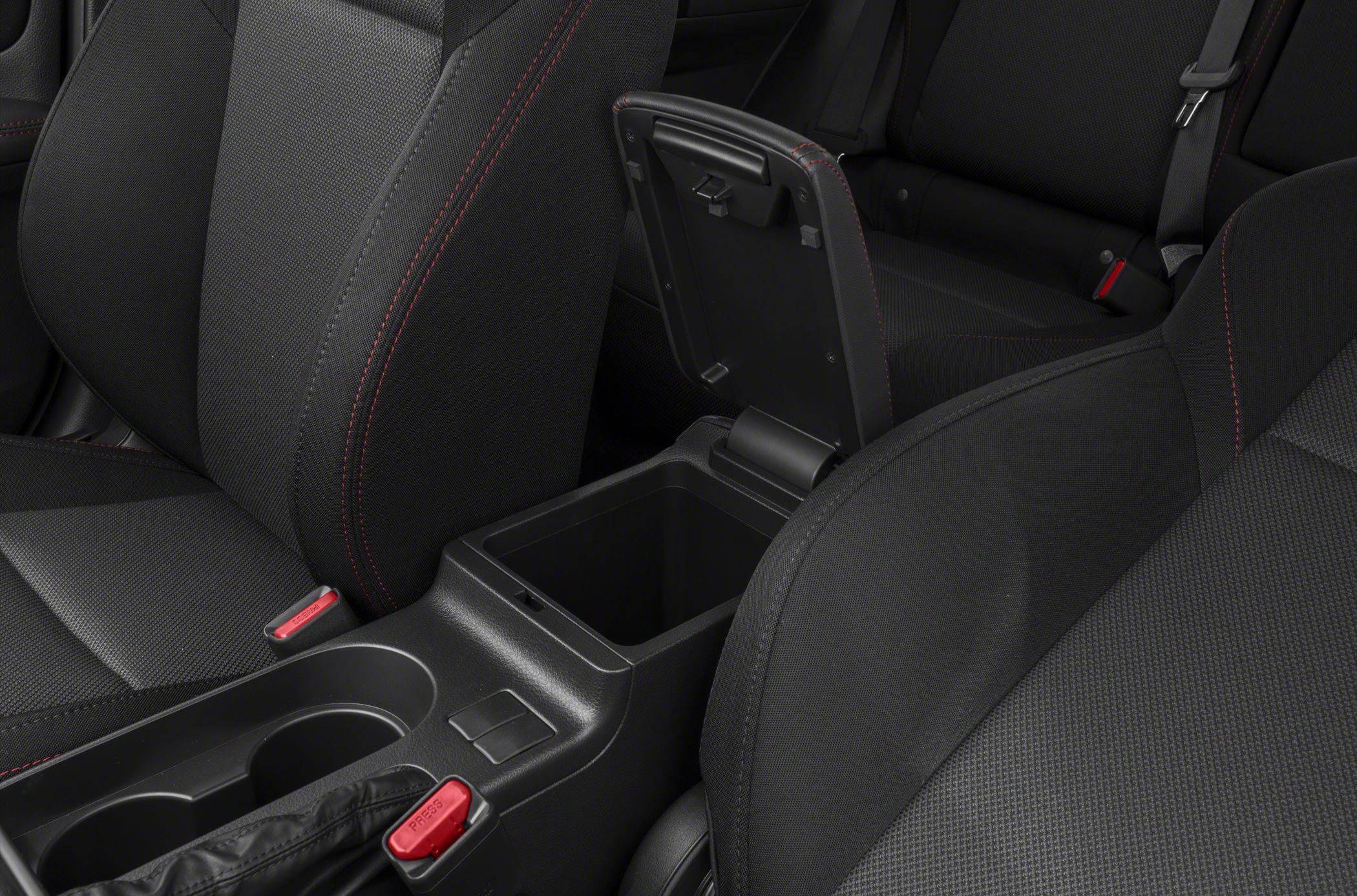 Car interior center console with open storage compartment and cup holders