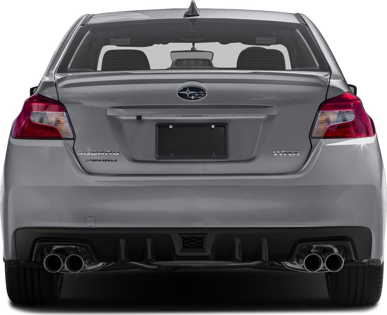 Rear view showing quad exhaust tips and integrated rear spoiler