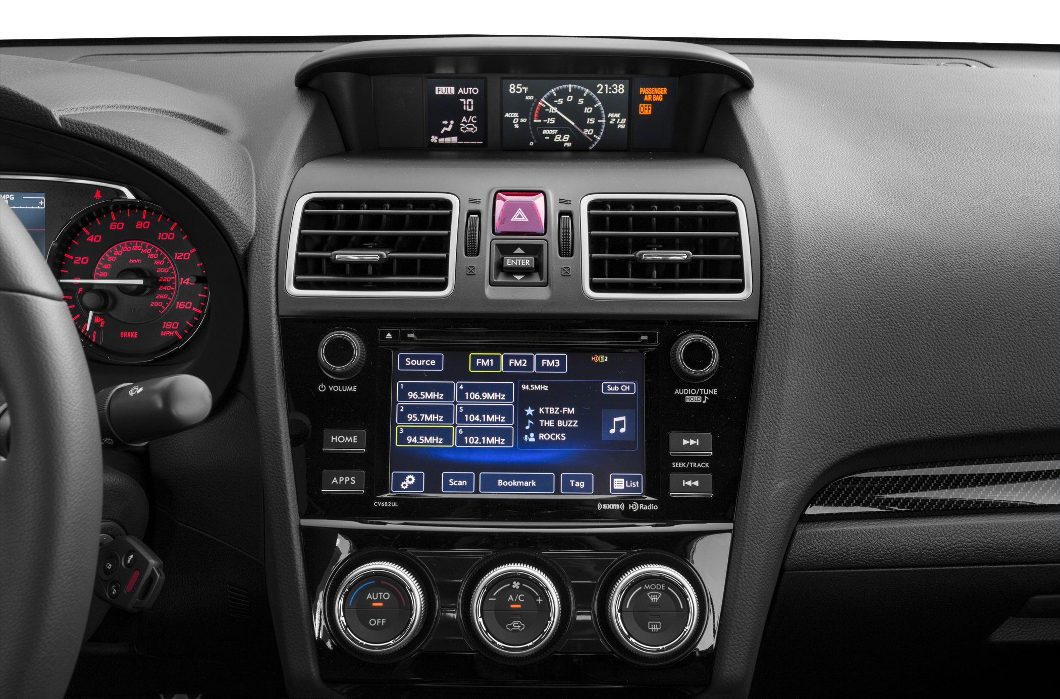 Dashboard with infotainment screen, air vents, and climate controls.