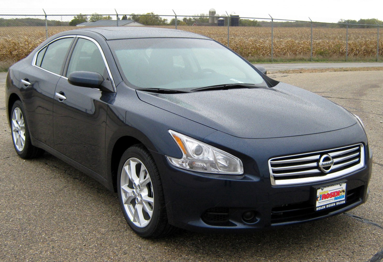 Sleek front and side view with alloy wheels and modern headlight