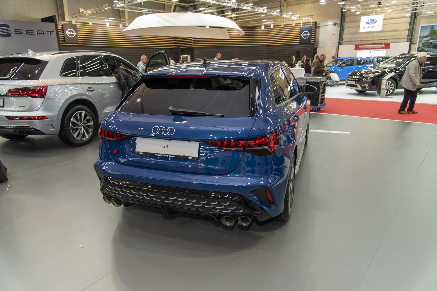 Sportback hatchback rear with quad exhaust and sleek taillights