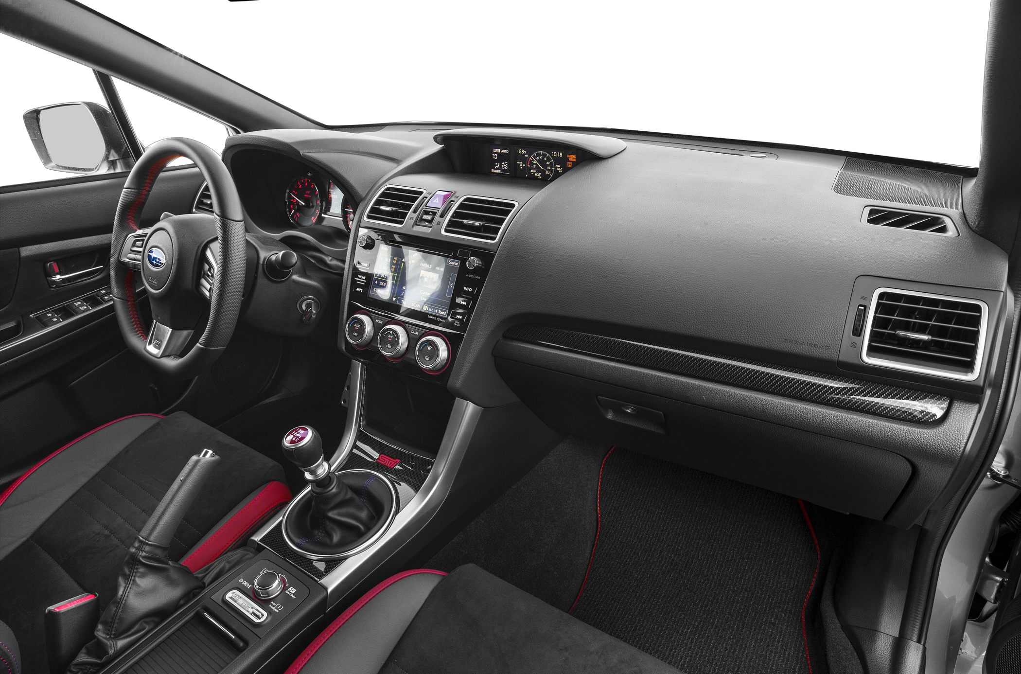 Sporty manual transmission interior with digital display and carbon fiber trim