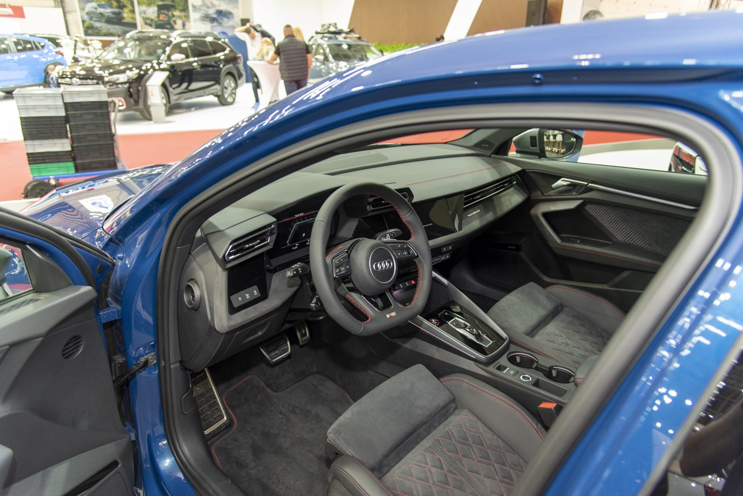 Digital dashboard, quilted seats, sporty steering wheel, center console