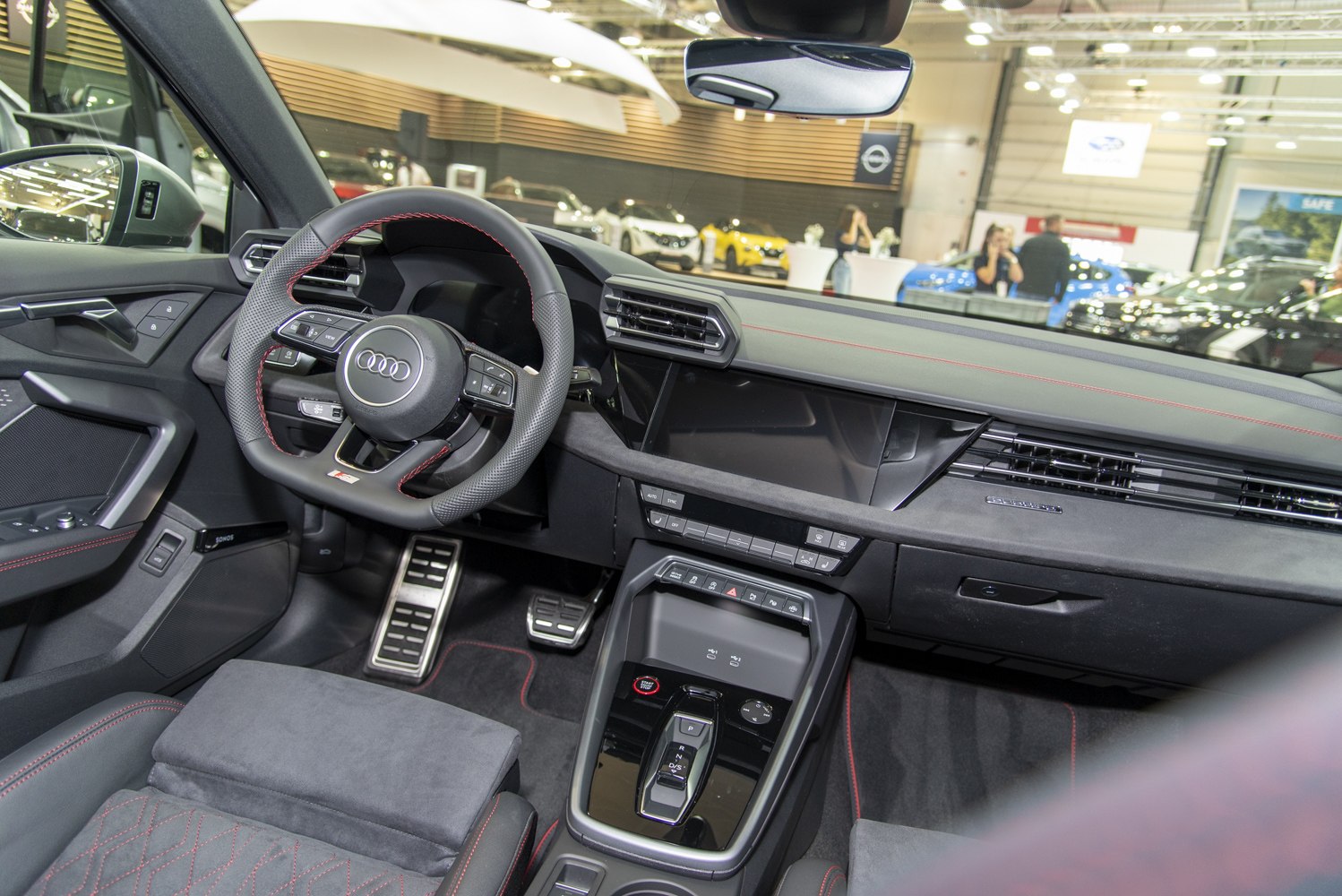 Sport steering wheel and sleek digital dashboard with modern center console