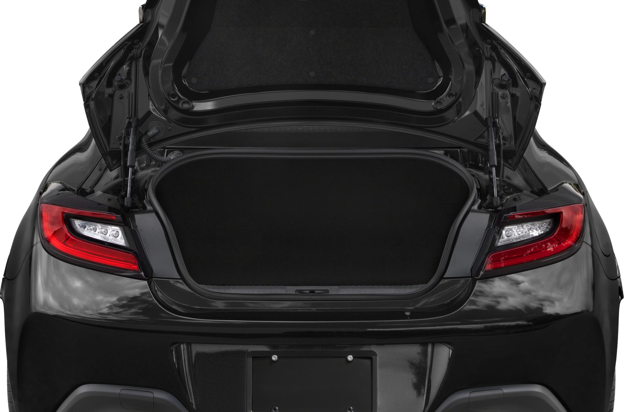 Rear open trunk with LED tail lights on a sporty coupe