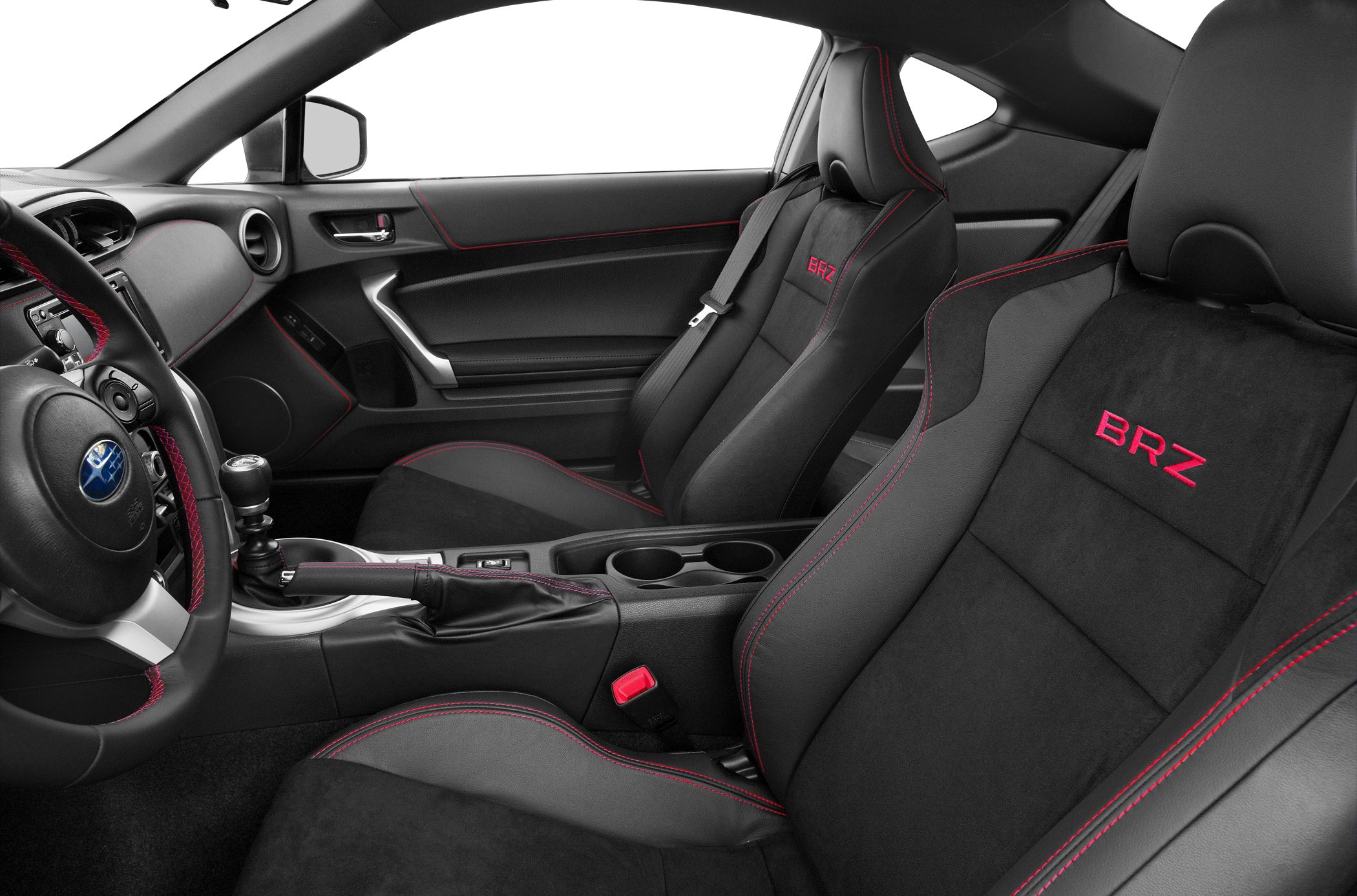 Sport seats with red stitching and manual gear shift interior