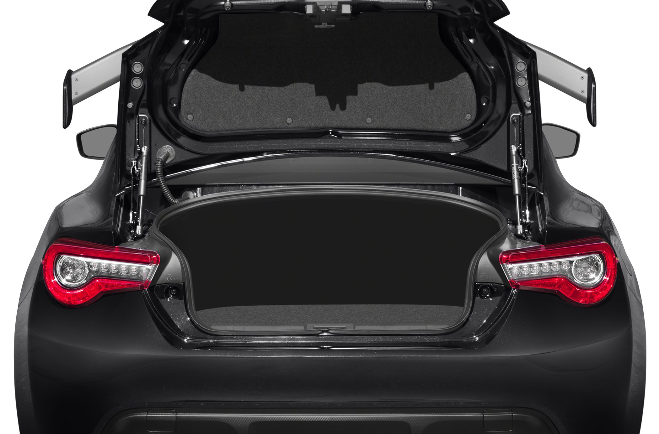 Open trunk with distinctive LED taillights of a sports coupe