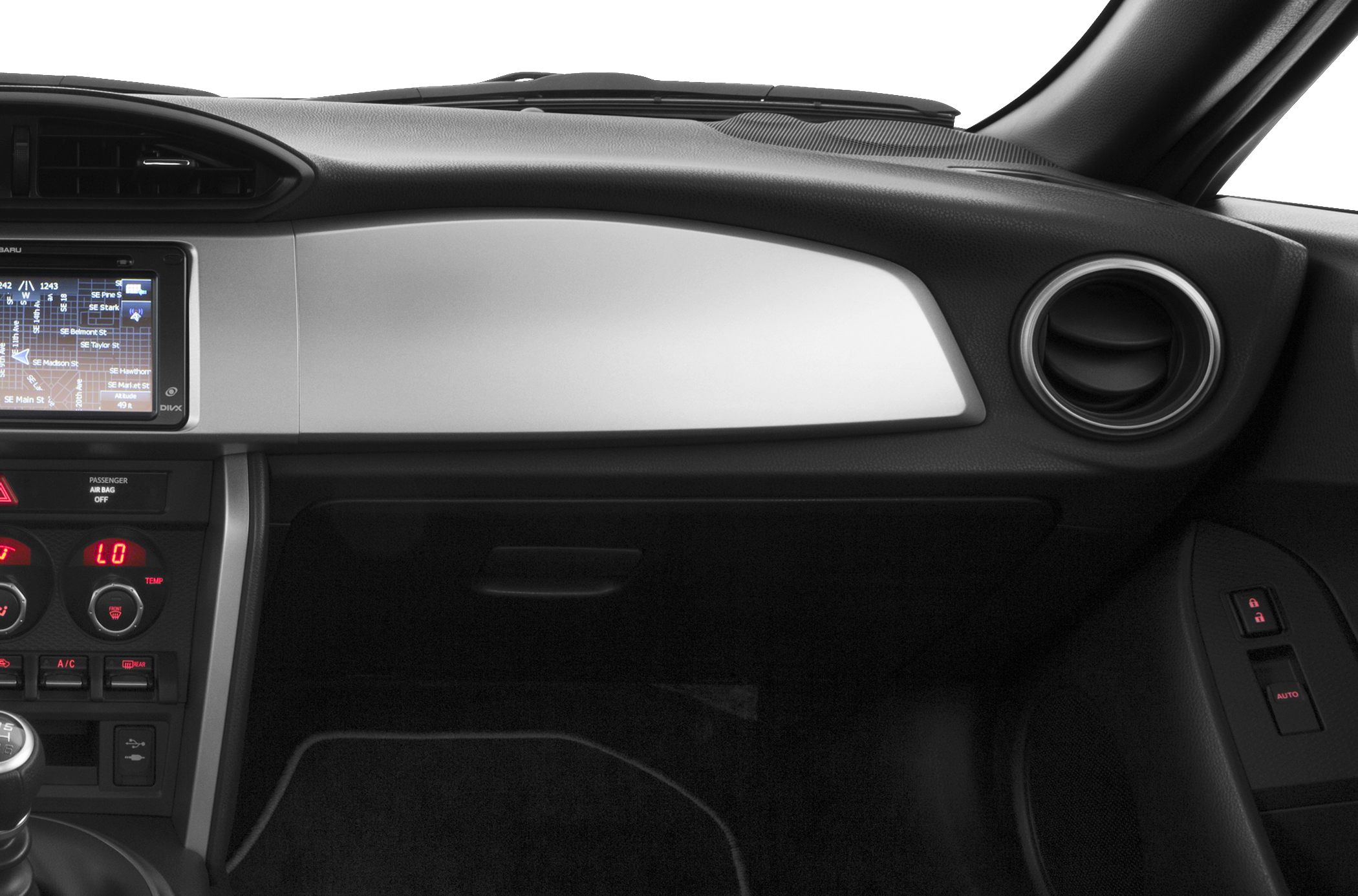 Dashboard with infotainment screen, climate controls, and air vents