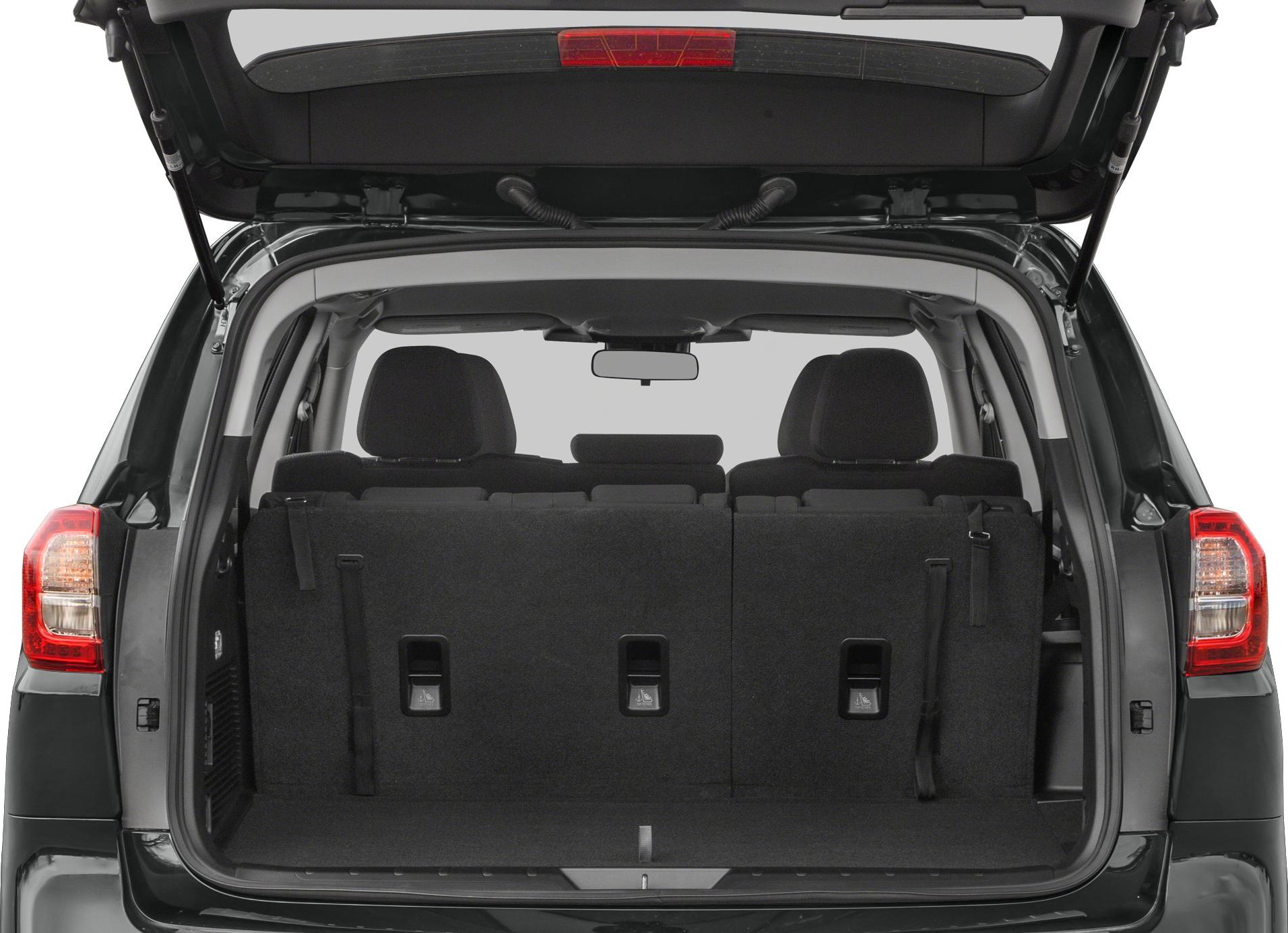 Open SUV rear cargo area with three upright seats visible