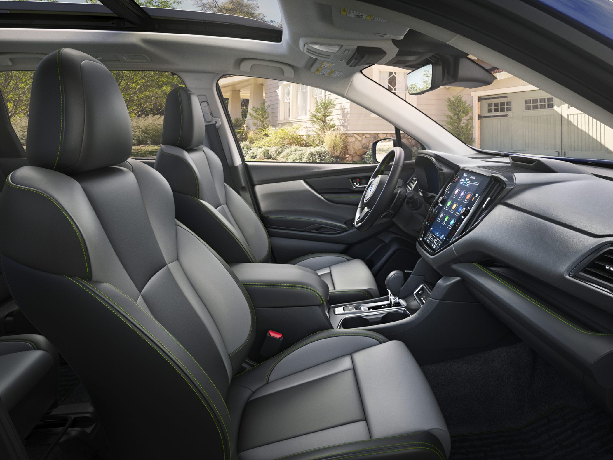 Modern SUV interior with leather seats and large infotainment screen