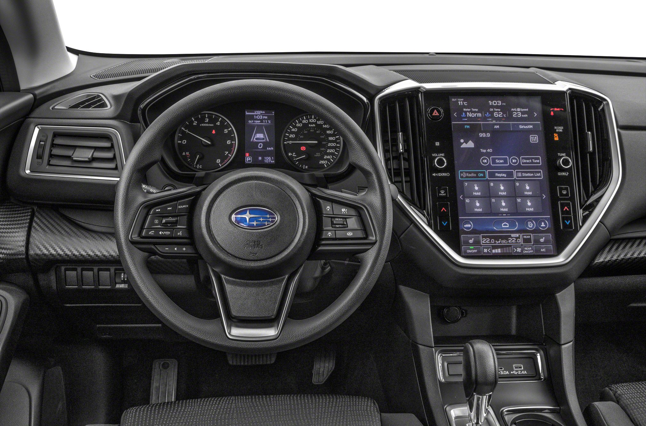 Steering wheel, instrument cluster, and large central touchscreen infotainment