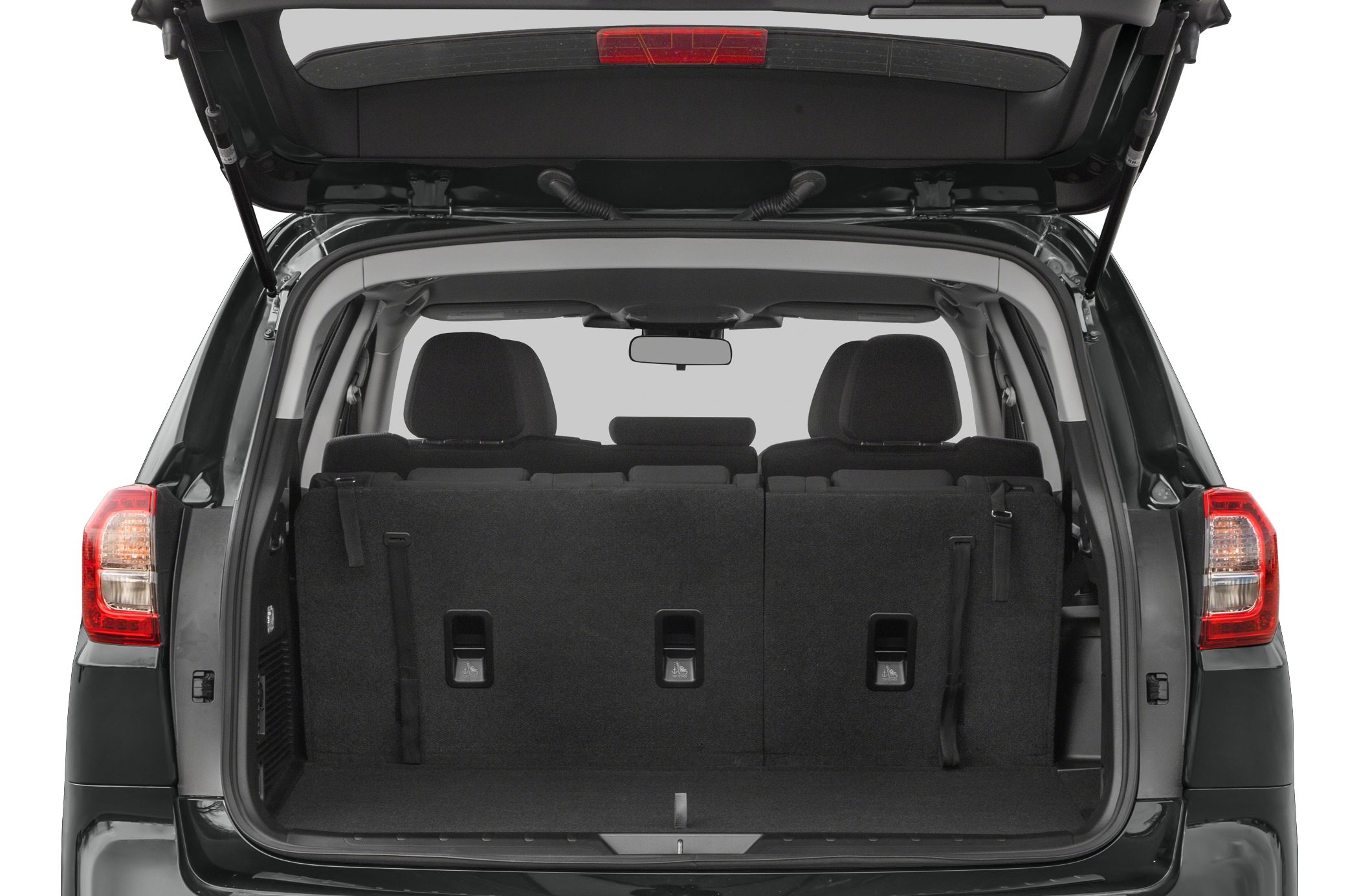 Spacious rear cargo area with folded third-row seats and open rear hatch