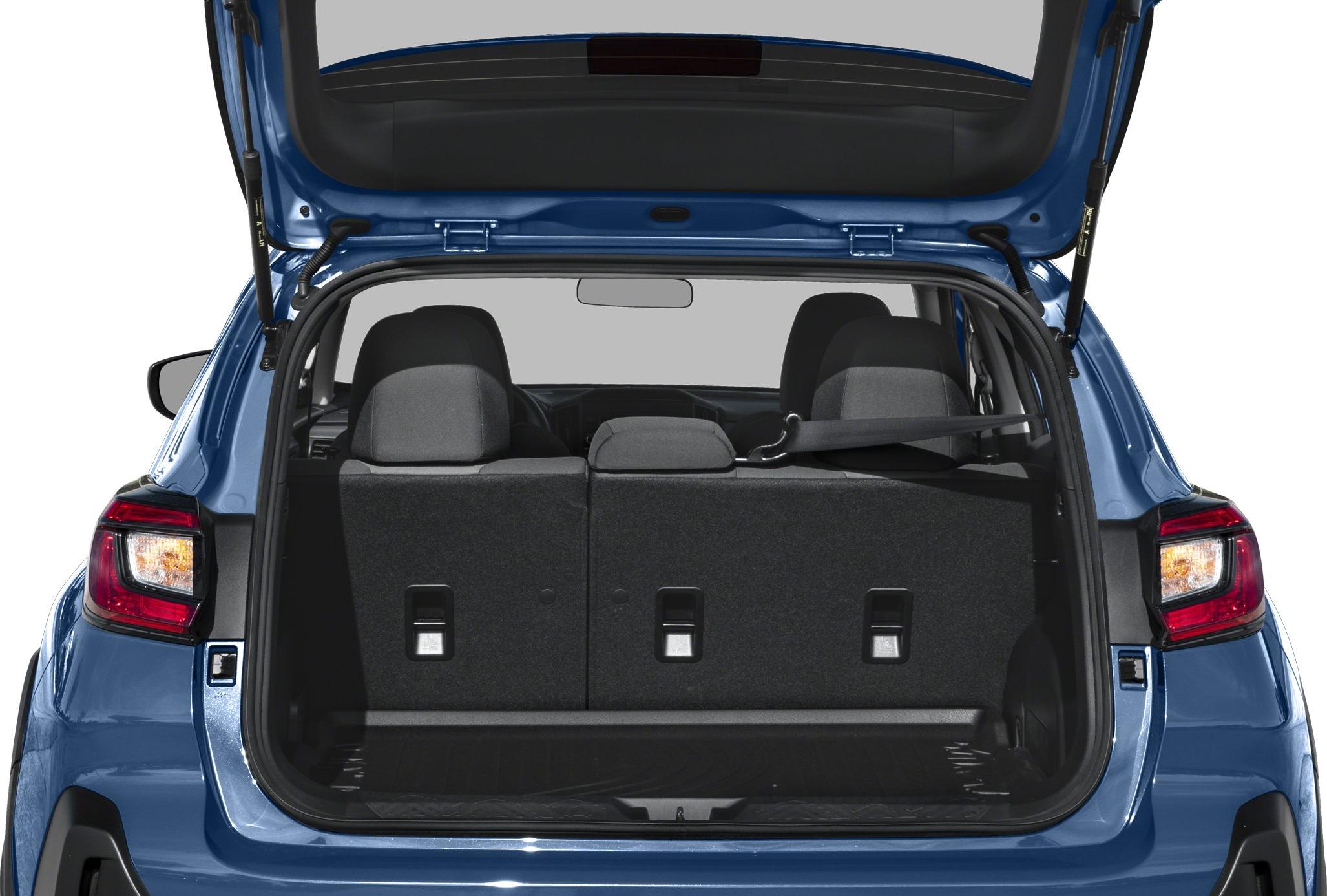 Rear cargo space view with upright seats in hatchback