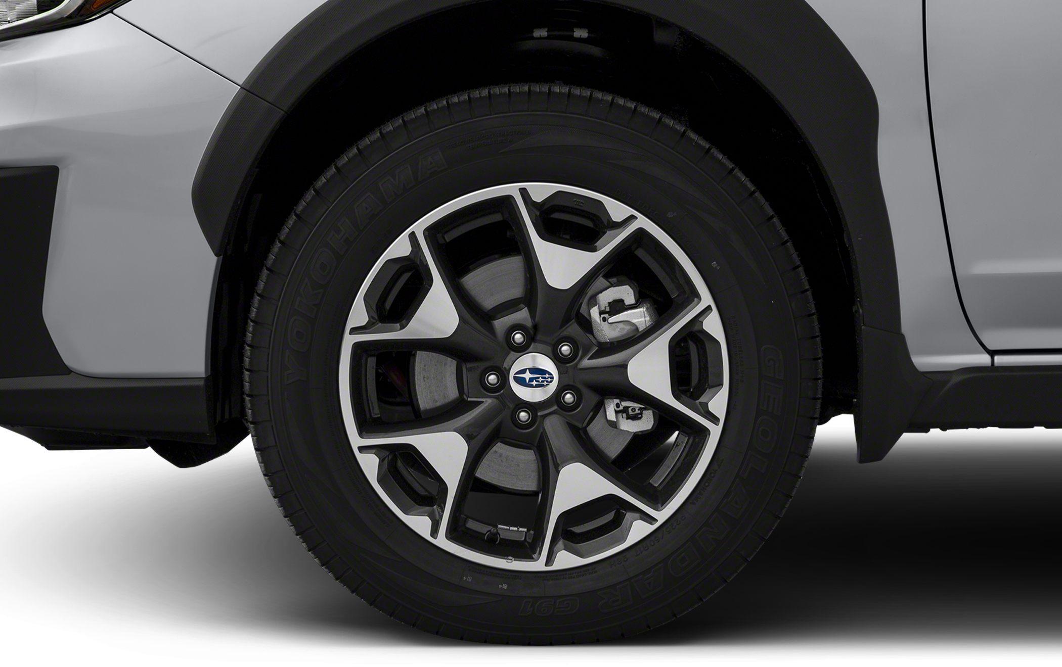 Close-up of alloy wheel with Yokohama tire and visible brake caliper