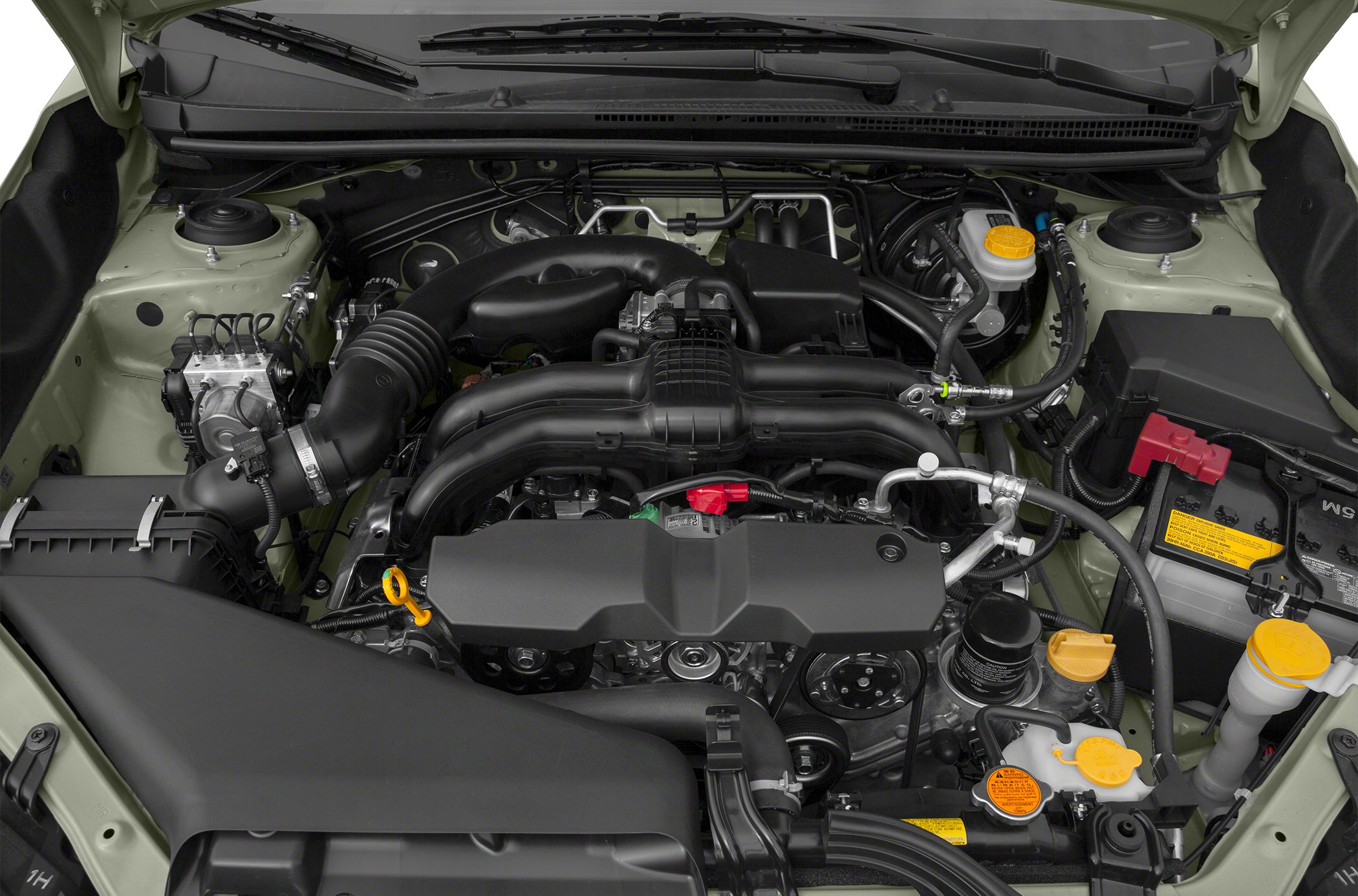 Close-up of engine bay components and layout with visible intake and fluid reservoirs.