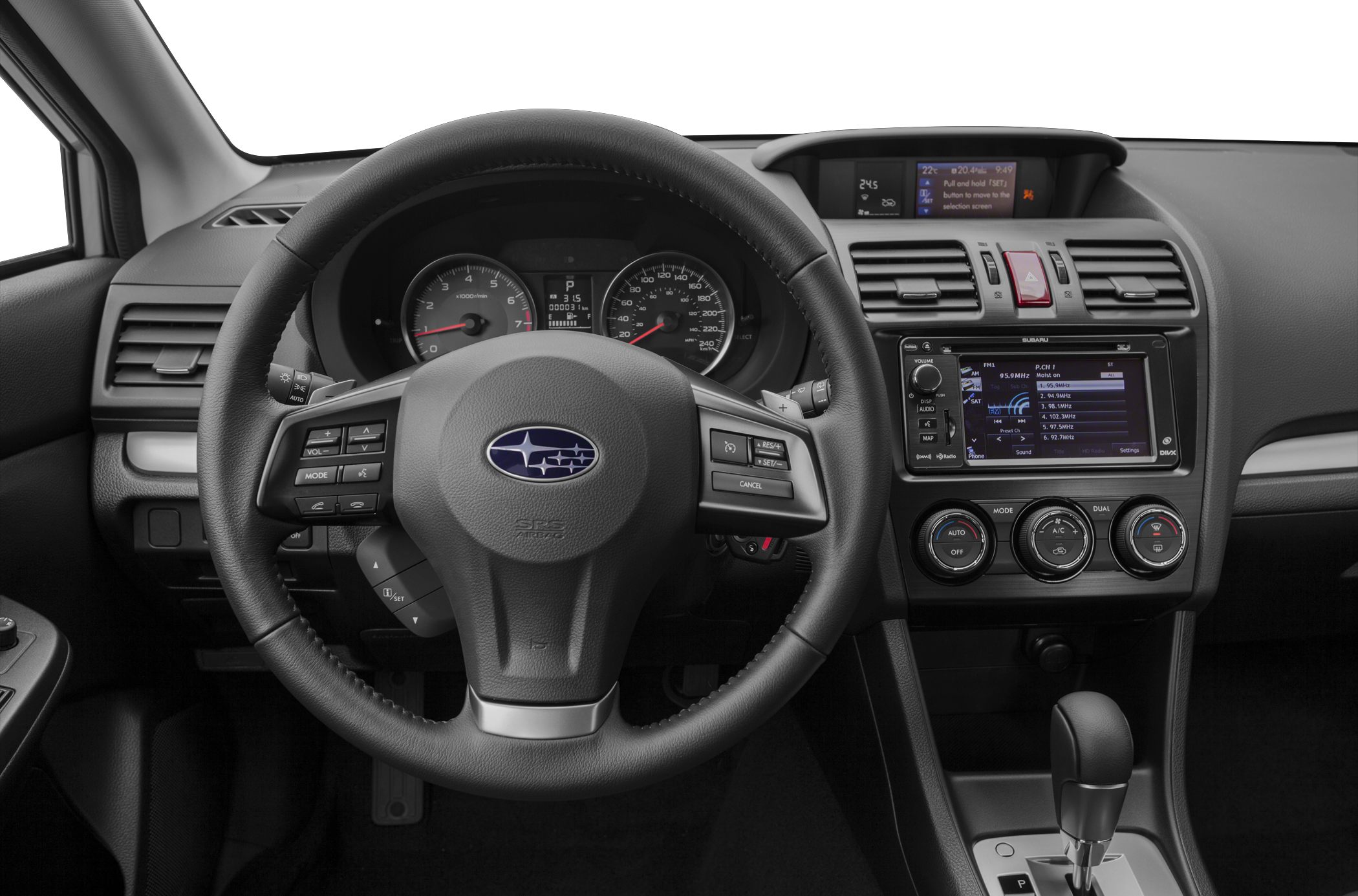 Steering wheel, dashboard instruments, and infotainment system in car interior