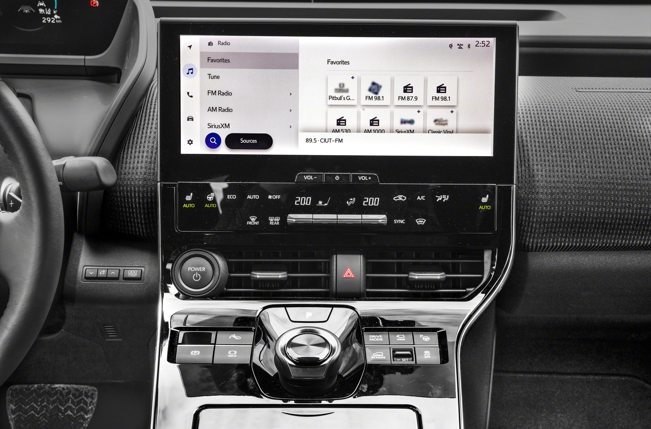 Large touchscreen infotainment and climate control panel