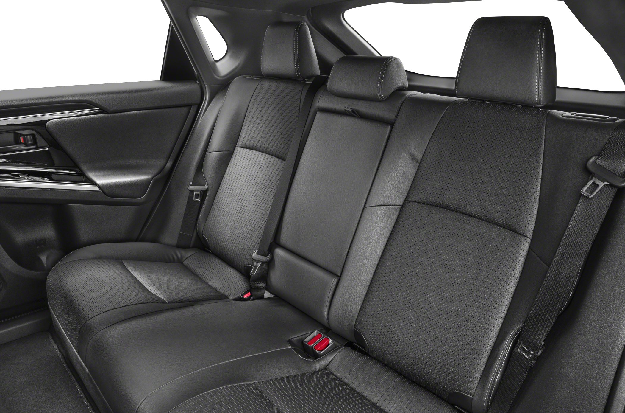 Spacious rear seating with black leather upholstery and headrests.