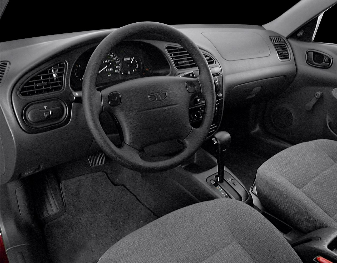 Steering wheel and automatic gearshift with fabric seats and dashboard controls