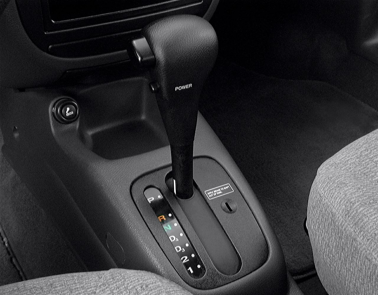 Automatic gear shift lever with gear positions display