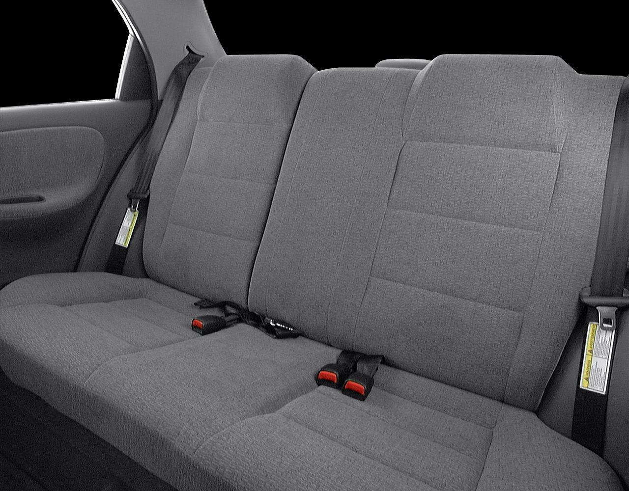 Rear fabric upholstery with seat belts and door panel