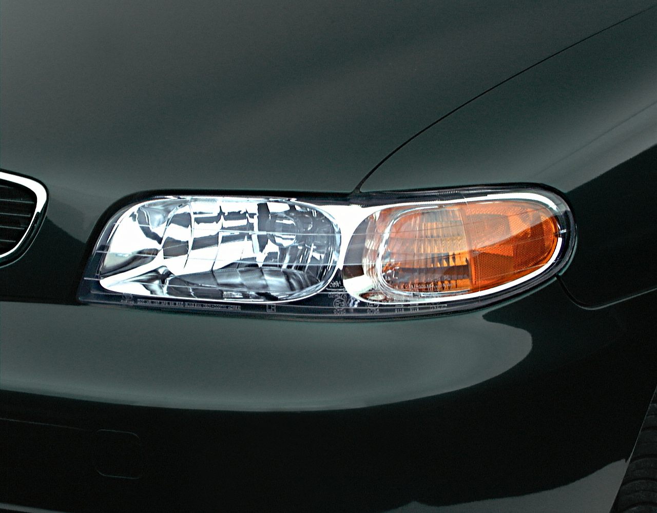 Close-up of car headlight and front signal light