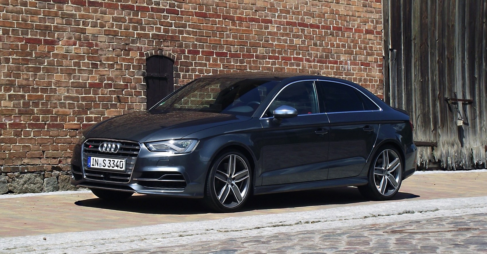 Front-side view featuring LED headlights and alloy wheels