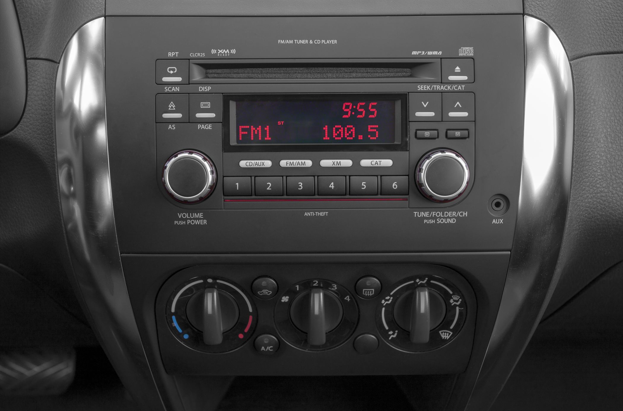 Car radio and manual climate control dials with digital display