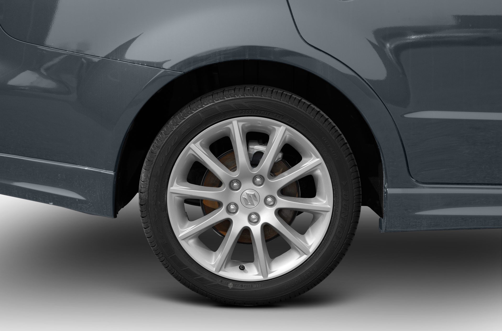 Alloy wheel and tire close-up with detailed rim and tread