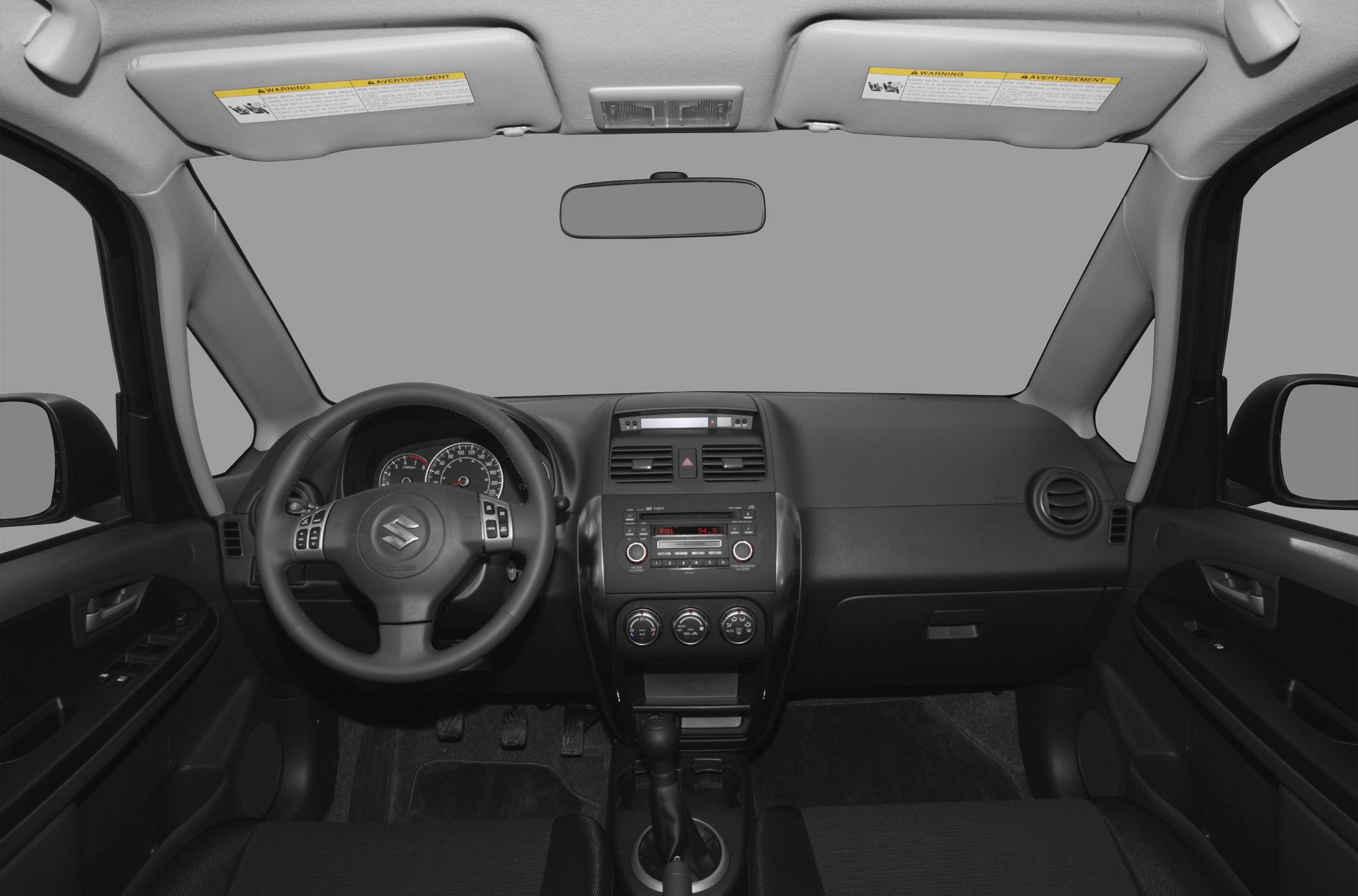 Dashboard layout with steering wheel and central control panel