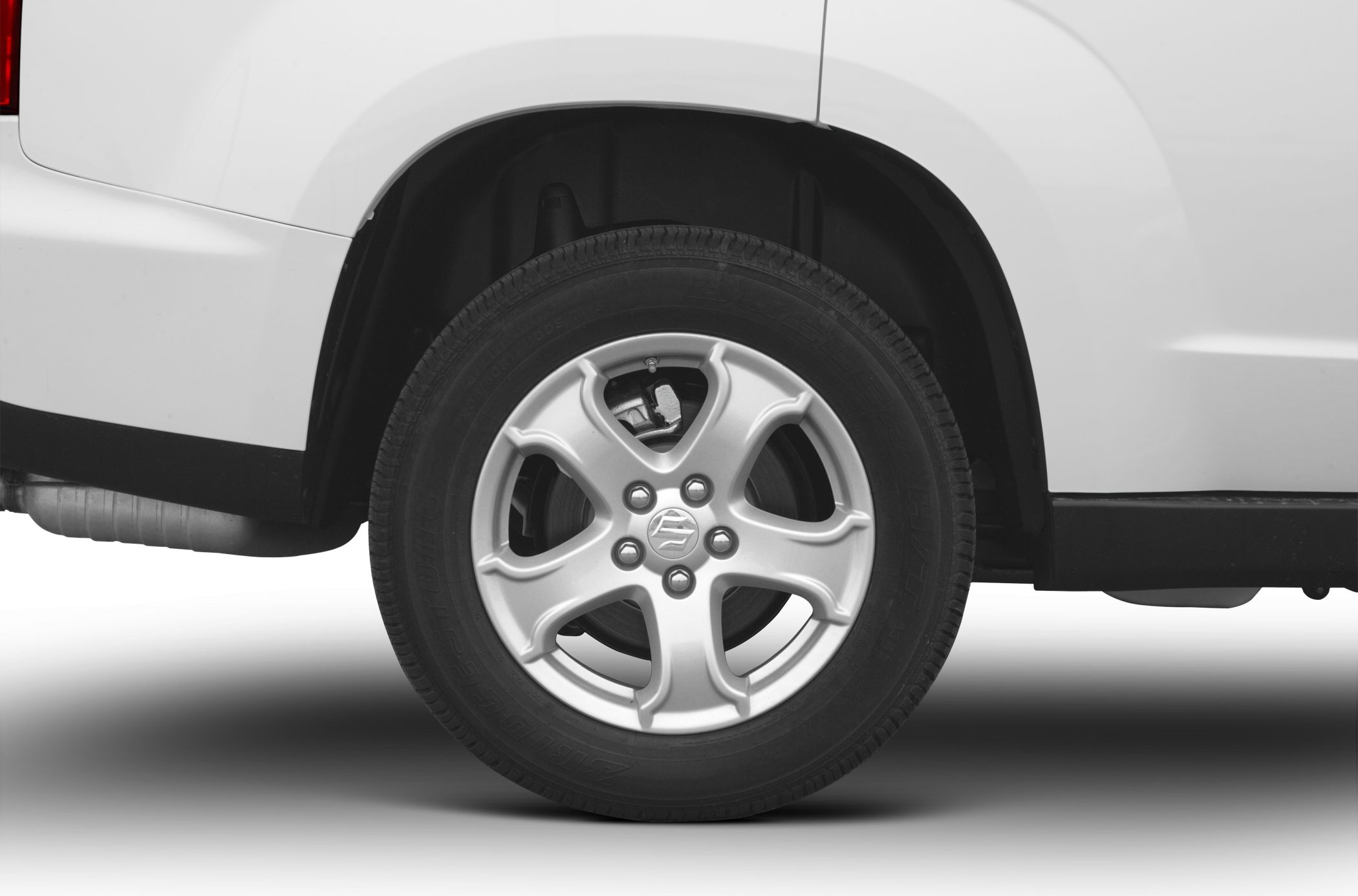 Close-up of a car alloy wheel and tire with visible rim design.