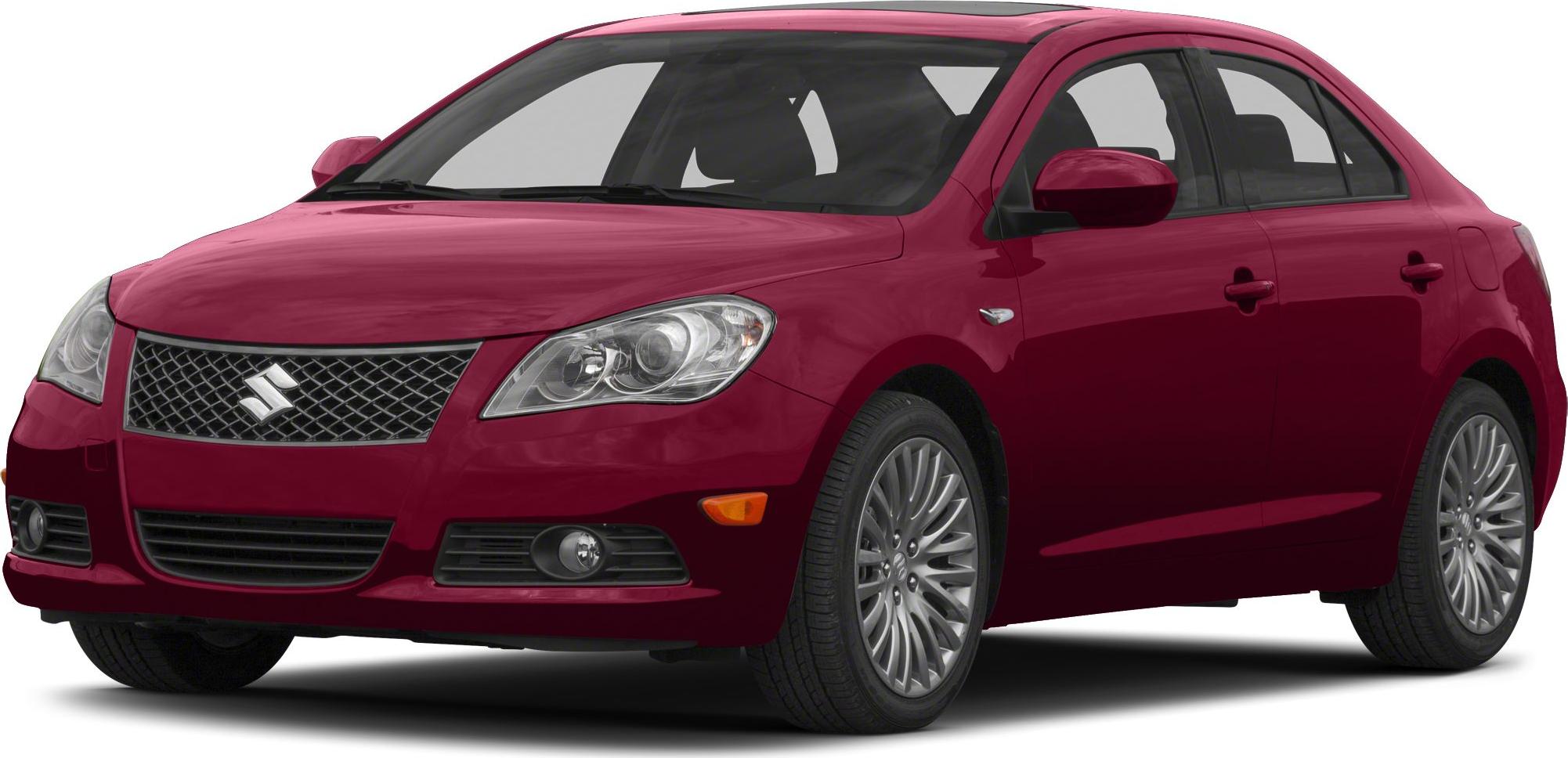 Front and side view of sedan with mesh grille and alloy wheels