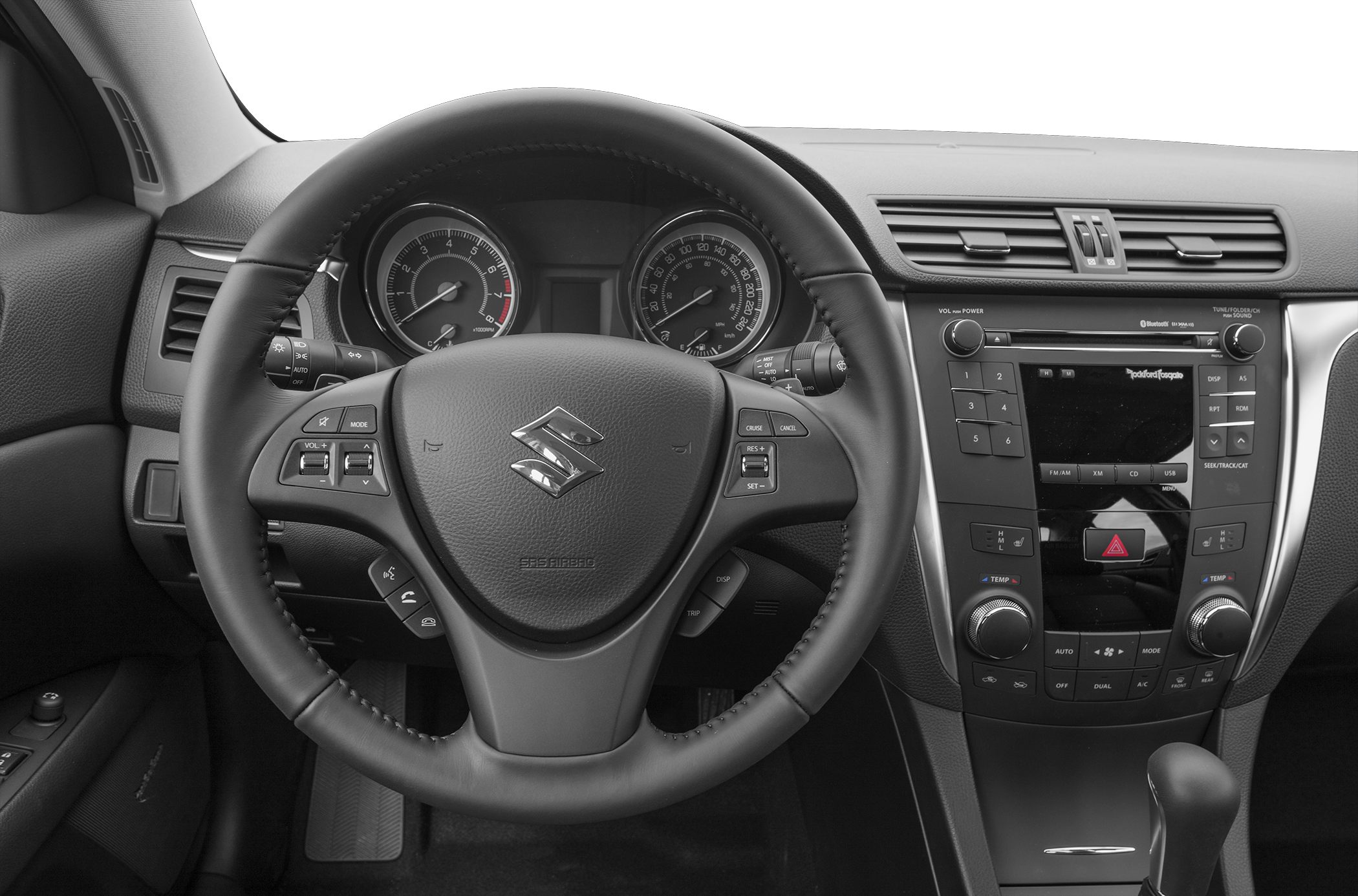 Steering wheel and dashboard with instrument cluster and control buttons