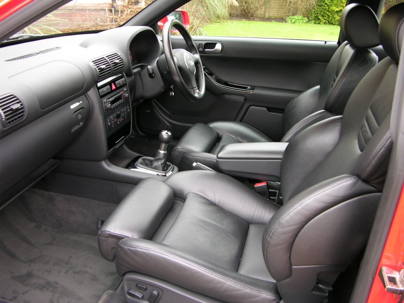 Leather seats and manual transmission cockpit interior