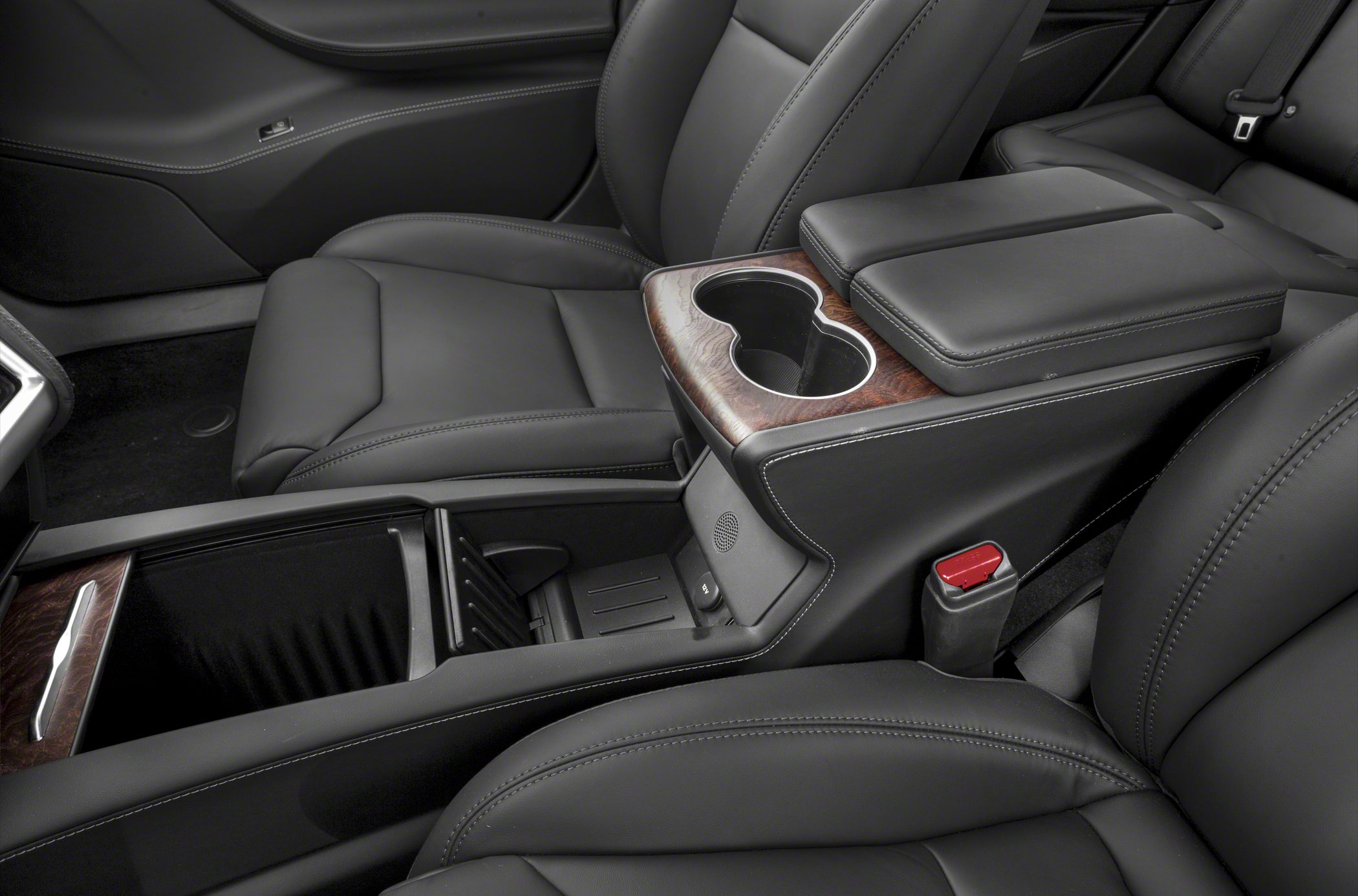 Leather seats and wood-trimmed center console with cup holders