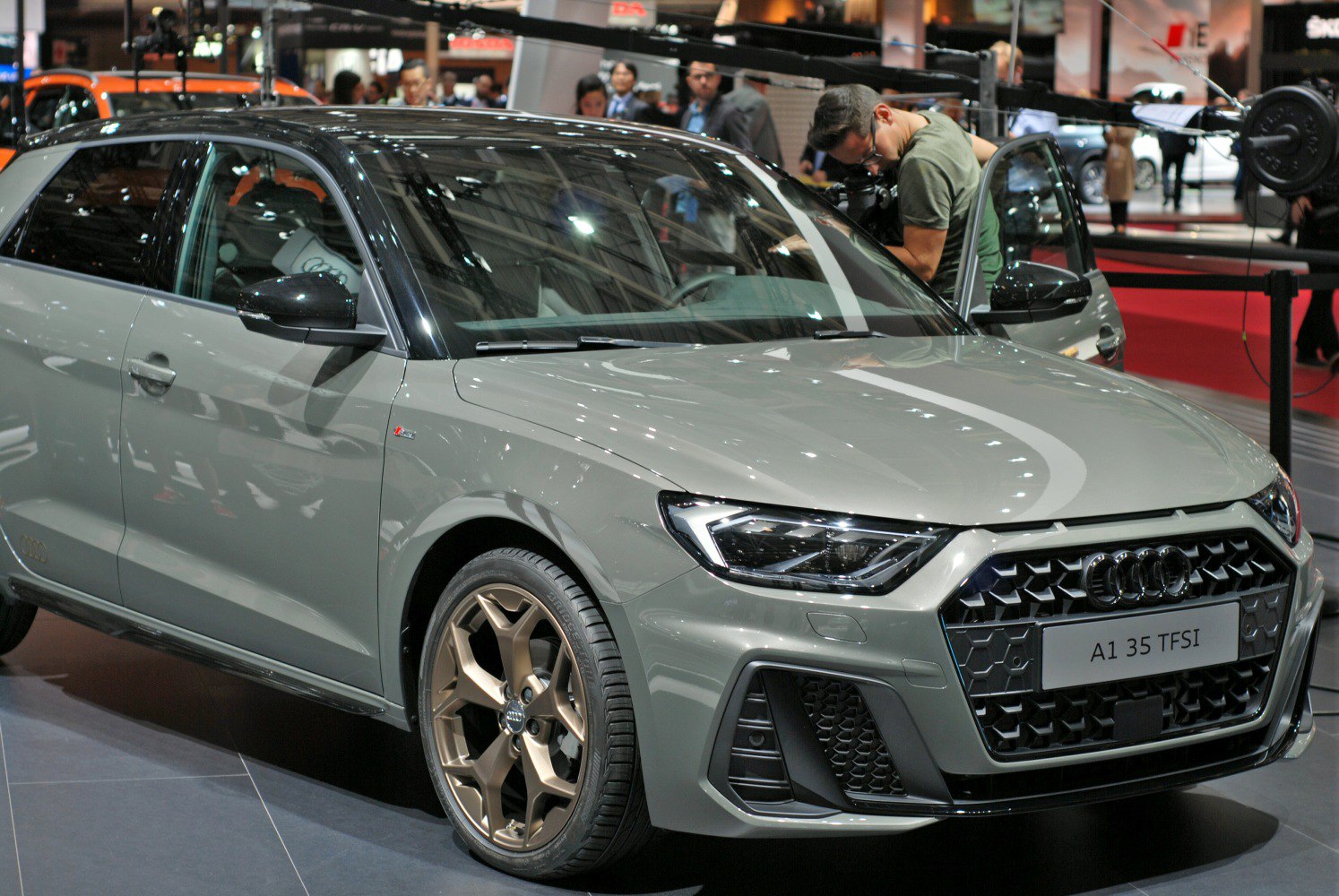 Front view showing LED headlights and bronze multi-spoke alloy wheels