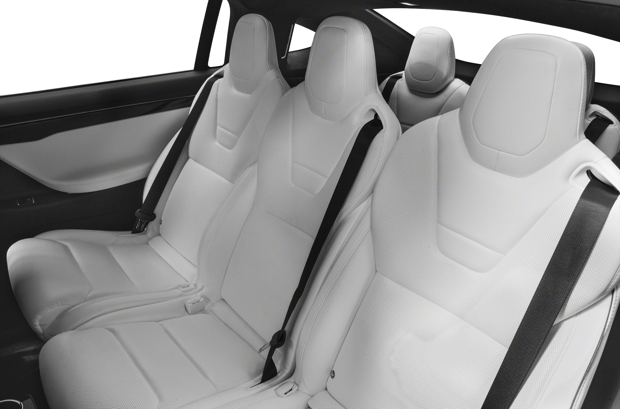 White leather seats and spacious back interior with seat belts visible