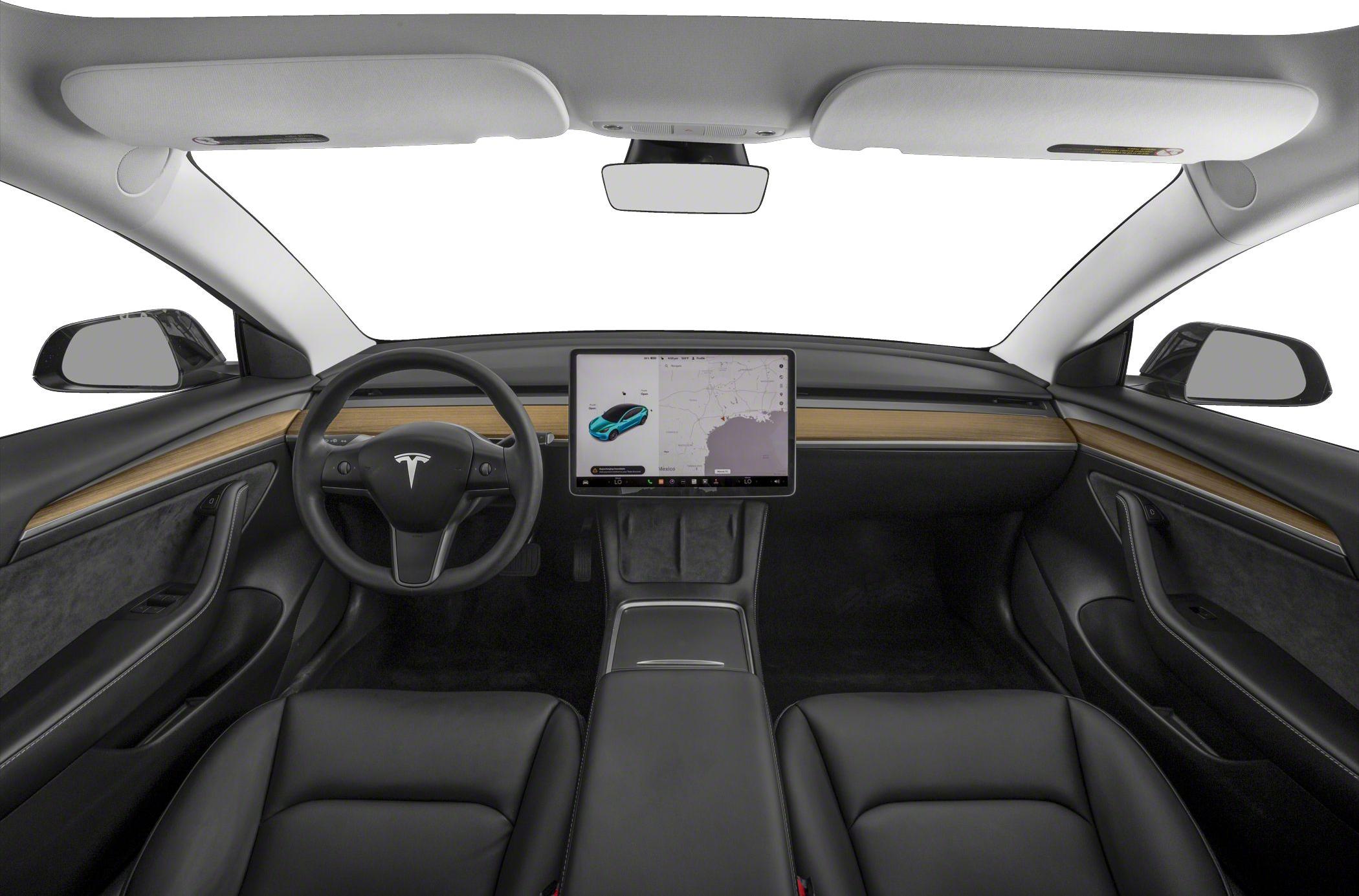 Minimalist interior with central touchscreen and wood trim