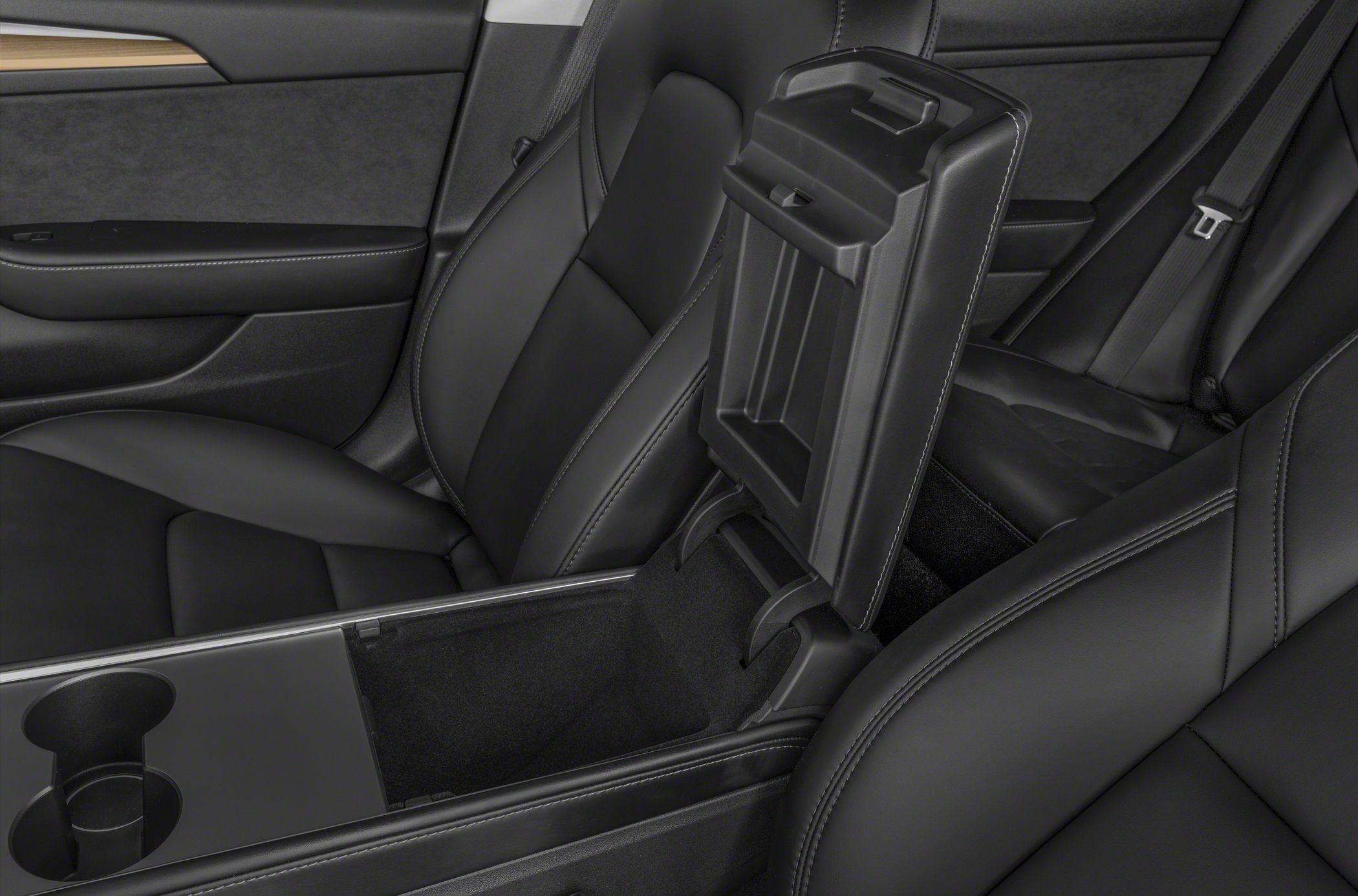 Center console storage with open lid and dual cup holders