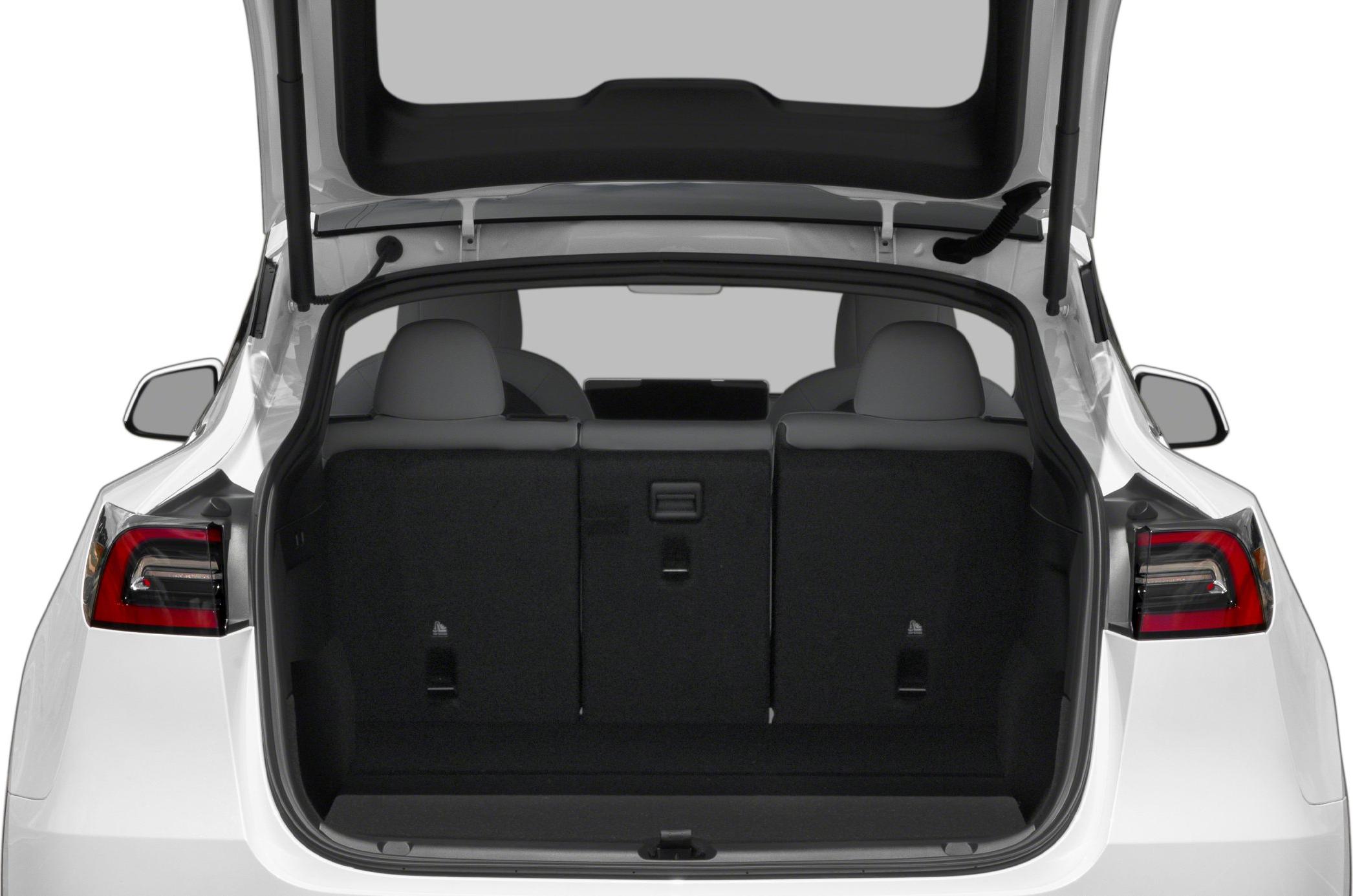 Rear cargo space and hatchback design of a white SUV
