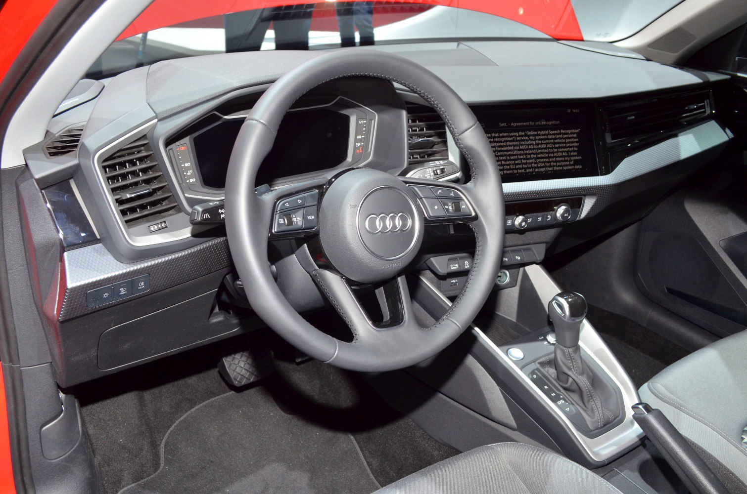 Steering wheel, digital dashboard, and center console gear shift