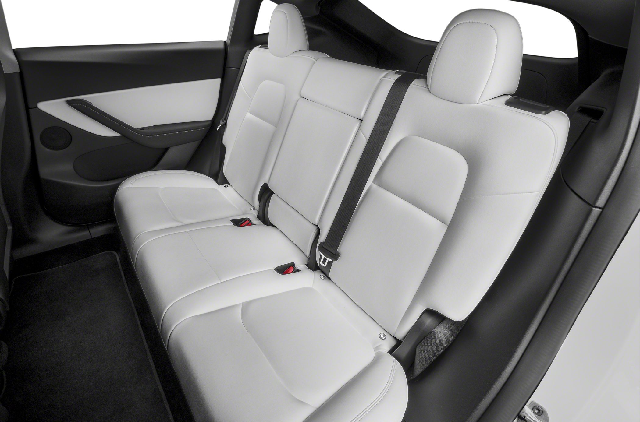 Rear seat interior with sleek, spacious design and integrated seatbelt.
