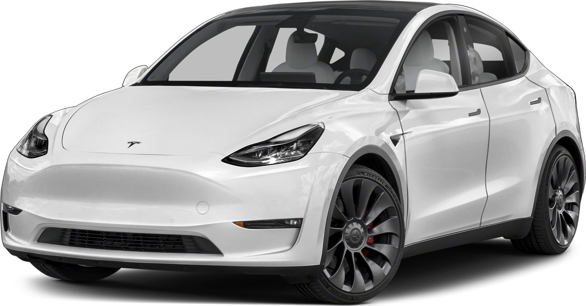 Front angle with aerodynamic headlights and alloy wheels