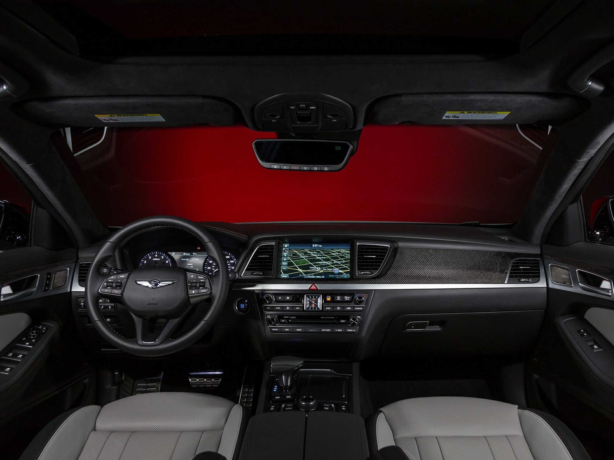 Dashboard with navigation screen and multifunction steering wheel