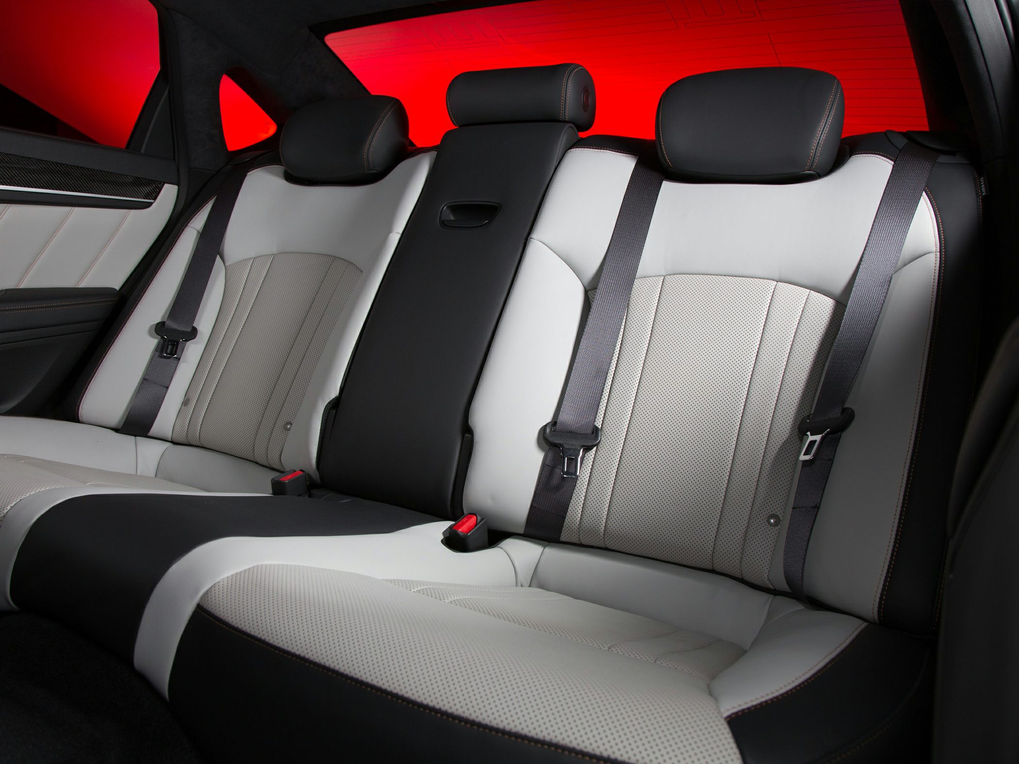 Rear seats with two-tone perforated leather and integrated headrests